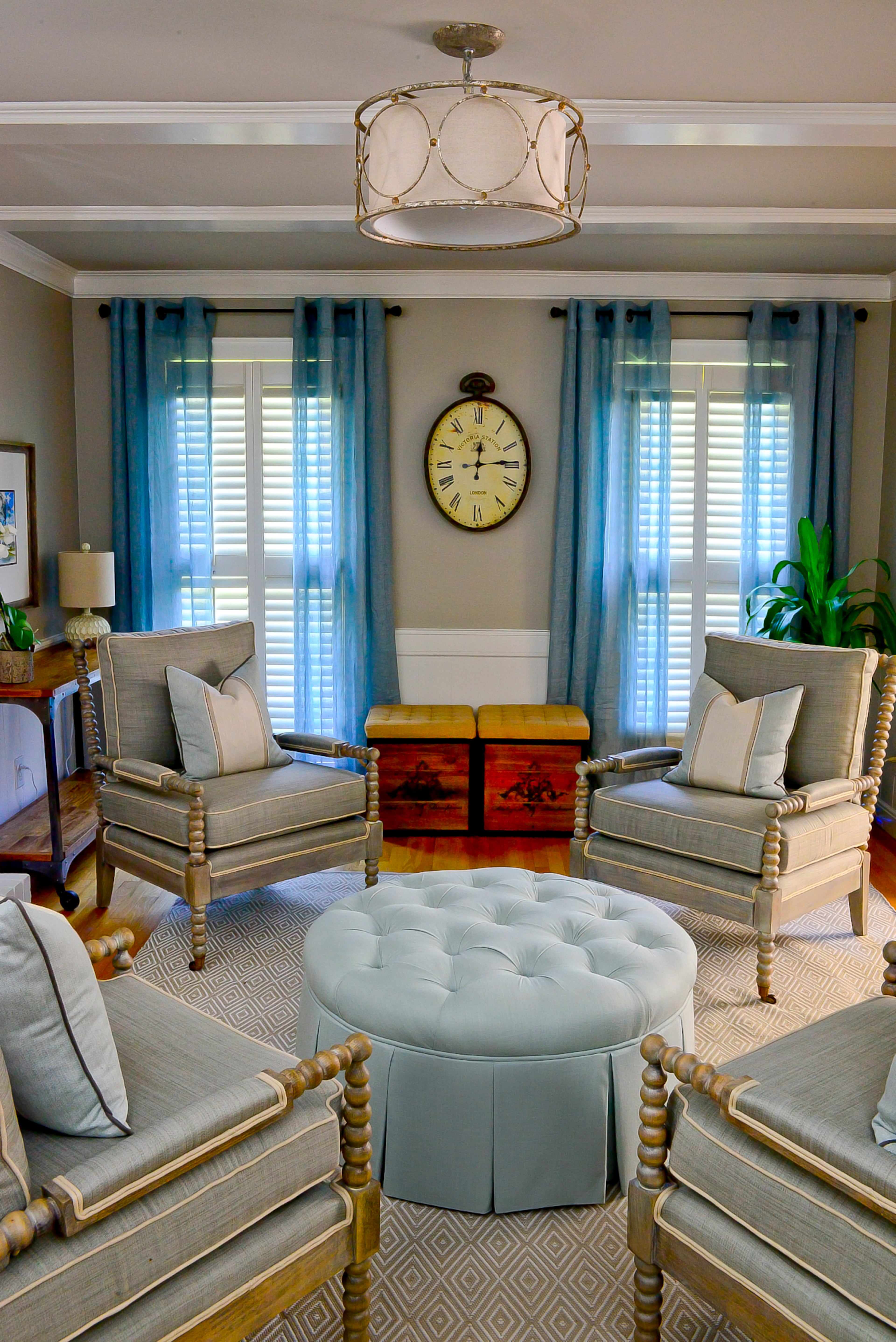 The living room's long and narrow layout made it difficult to have two love seats, said homeowner Renee Morehouse. She worked with designer Lauren Harris to select four DR Kinkaid chairs and a ottoman to create a stylish room for entertaining.