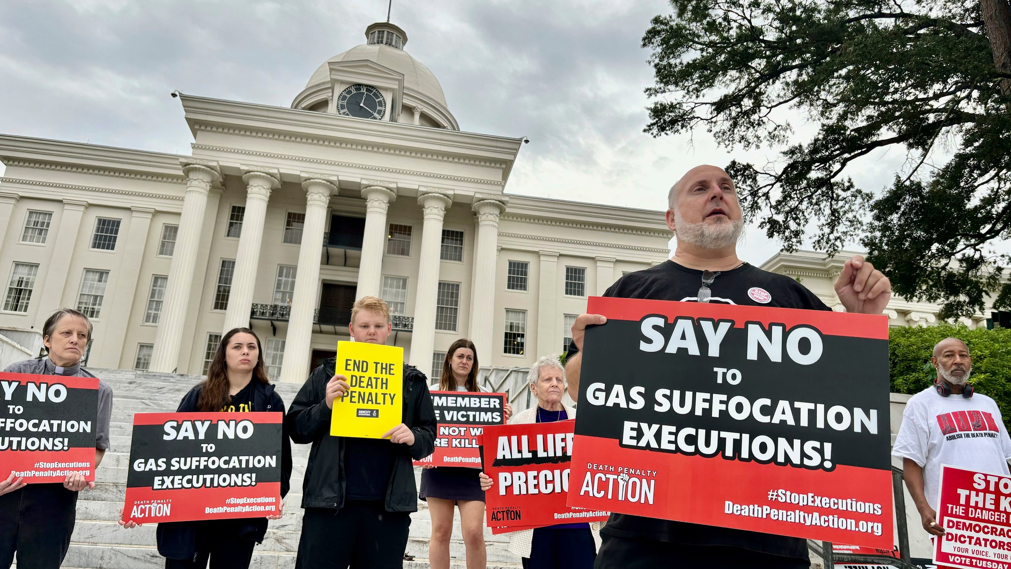 FILE - Abraham Bonowitz, executive director of Death Penalty Action, and other death penalty opponents hold a demonstration outside the Alabama Capitol in Montgomery, Ala., Wednesday, Sept. 25, 2024, asking the state to call off the scheduled execution of Alan Miller in what would be the nation's second execution using nitrogen gas. (AP Photo/Kim Chandler, File)