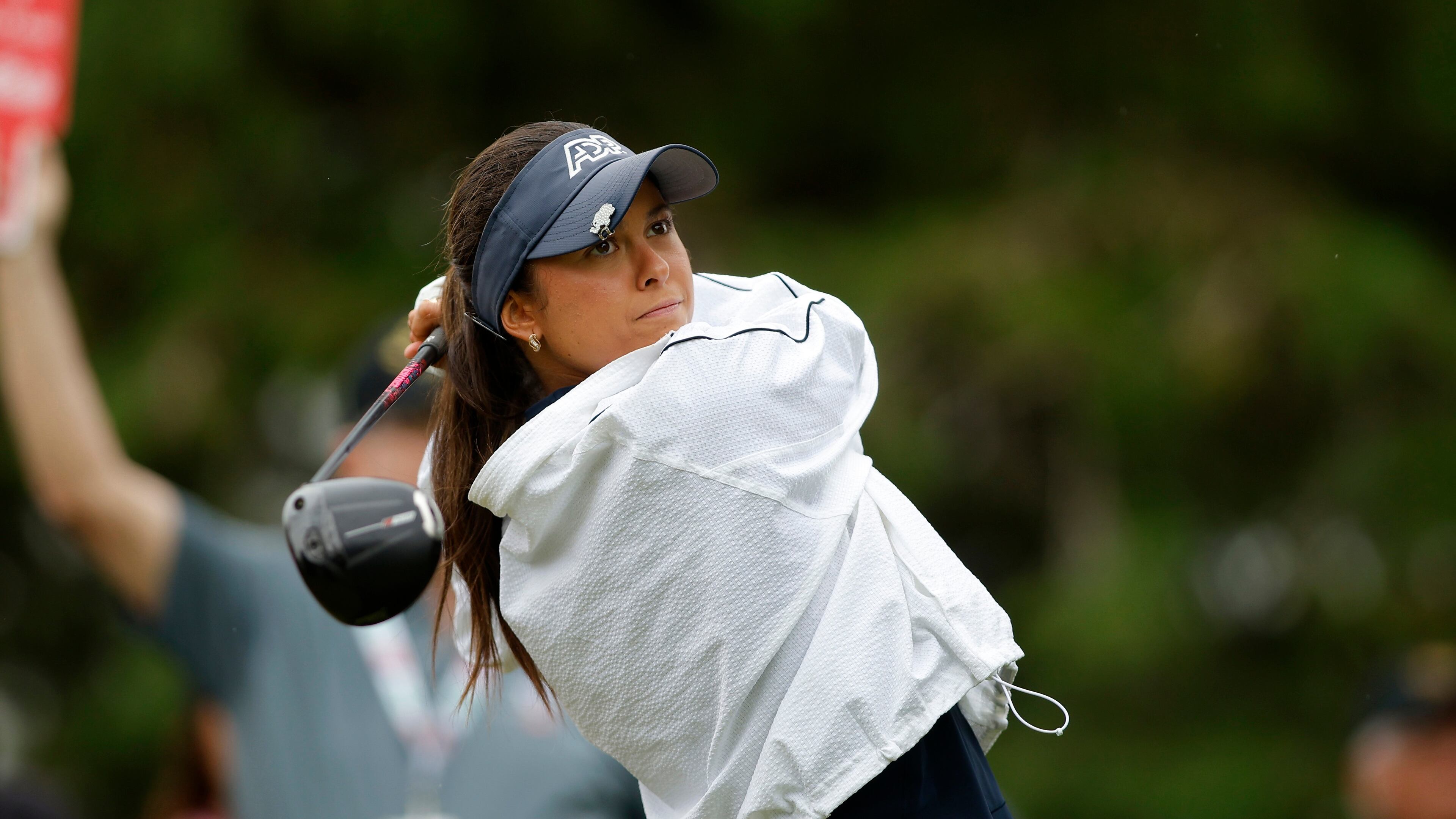 Yana Wilson watches her tee shot on the 10th hole during the final round of the Dow Championship LPGA golf tournament, Sunday, June 14, 2026, at Midland Country Club in Midland, Mich. (AP Photo/Al Goldis)