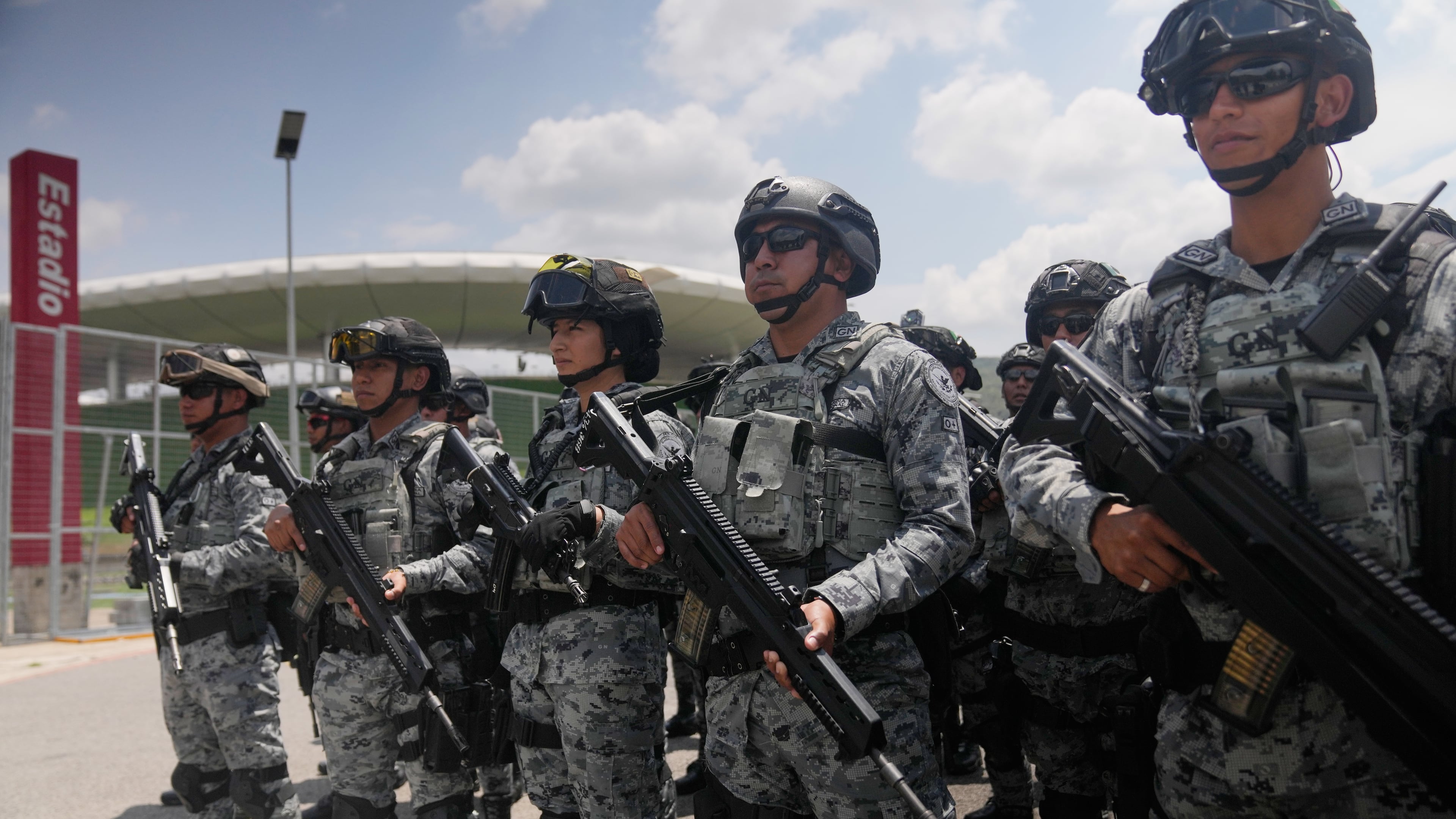 National Guard deploy outside the stadium that will host FIFA World Cup matches in Guadalajara, Mexico, Tuesday, June 9, 2026. (AP Photo/Matias Delacroix)
