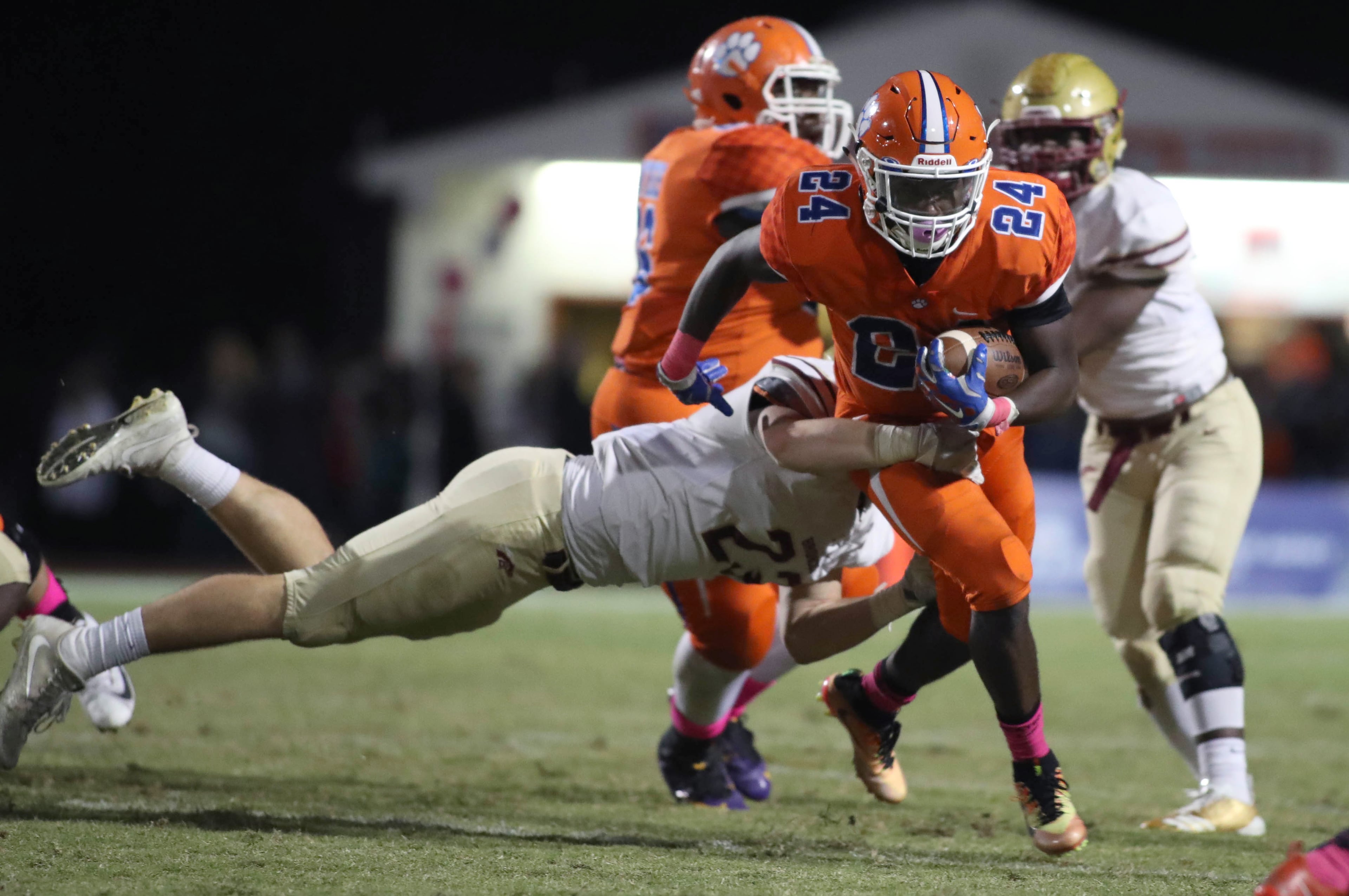 October 20, 2017 - Lilburn, Ga: Brookwood linebacker Chris Cotter (23) tackles Parkview running back Christian Malloy (24) in the first half of their game at Parkview High School Friday, October 20, 2017, in Lilburn, Ga.. PHOTO / JASON GETZ
