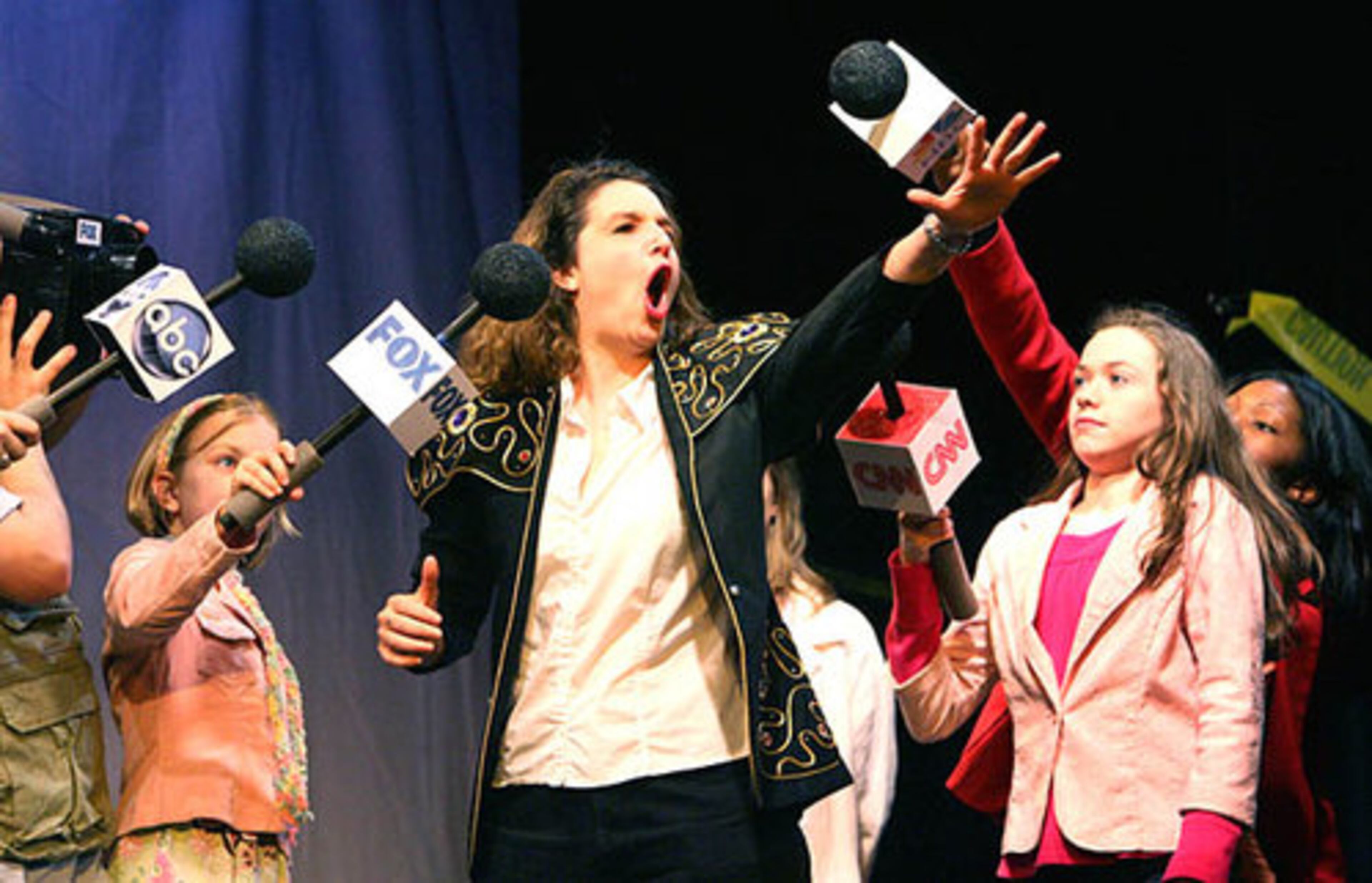 "Runaway Bride" Jennifer Wilbanks manages to stay out of the news entirely, except for a new musical by Red Clay Theater in Duluth. But the 60 people who show up on opening night (a scene from the production is seen here) find that Wilbanks is never even mentioned in the play about her and that it runs only 65 minutes. Best touch: TV reporters are played by children.