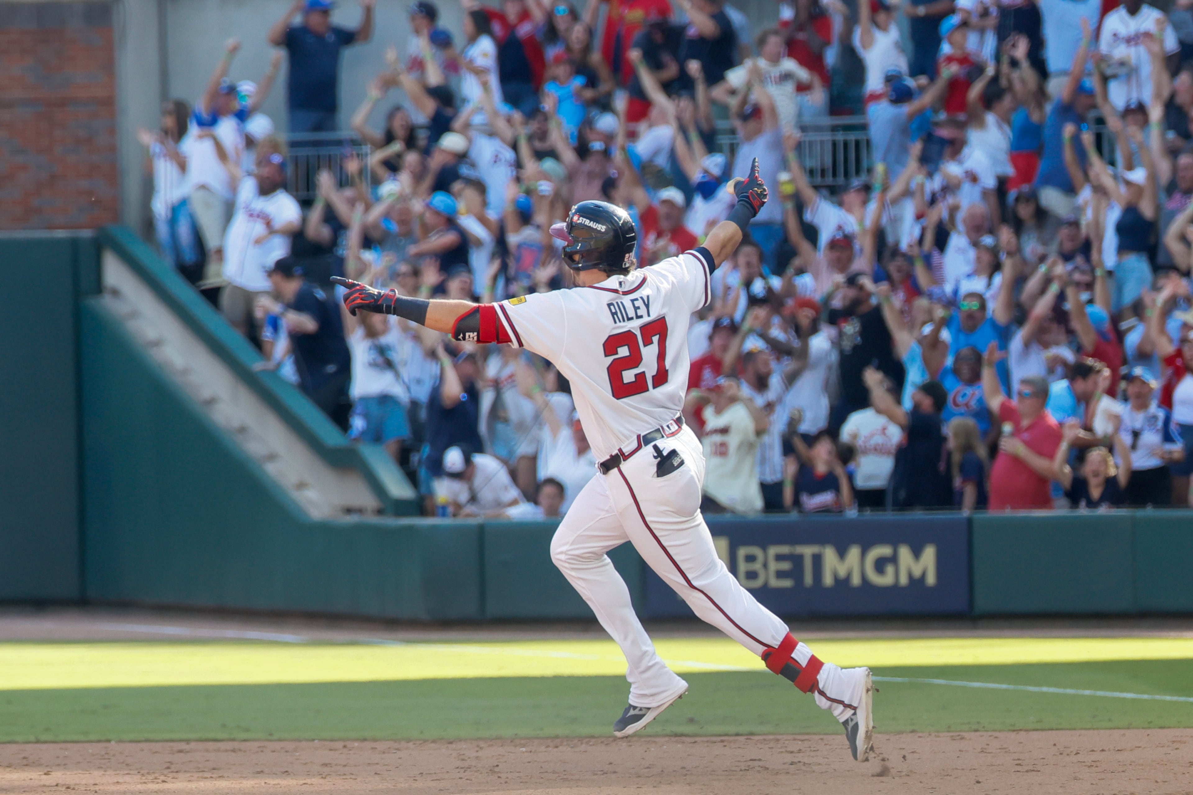 The Braves' Austin Riley rounds the bases after hitting a three-run home run against the Phillies in the eighth inning of Game 1 of the National League Wild Card Series on Tuesday, Sept. 29, 2026, in Atlanta. (Miguel Martinez/AJC)