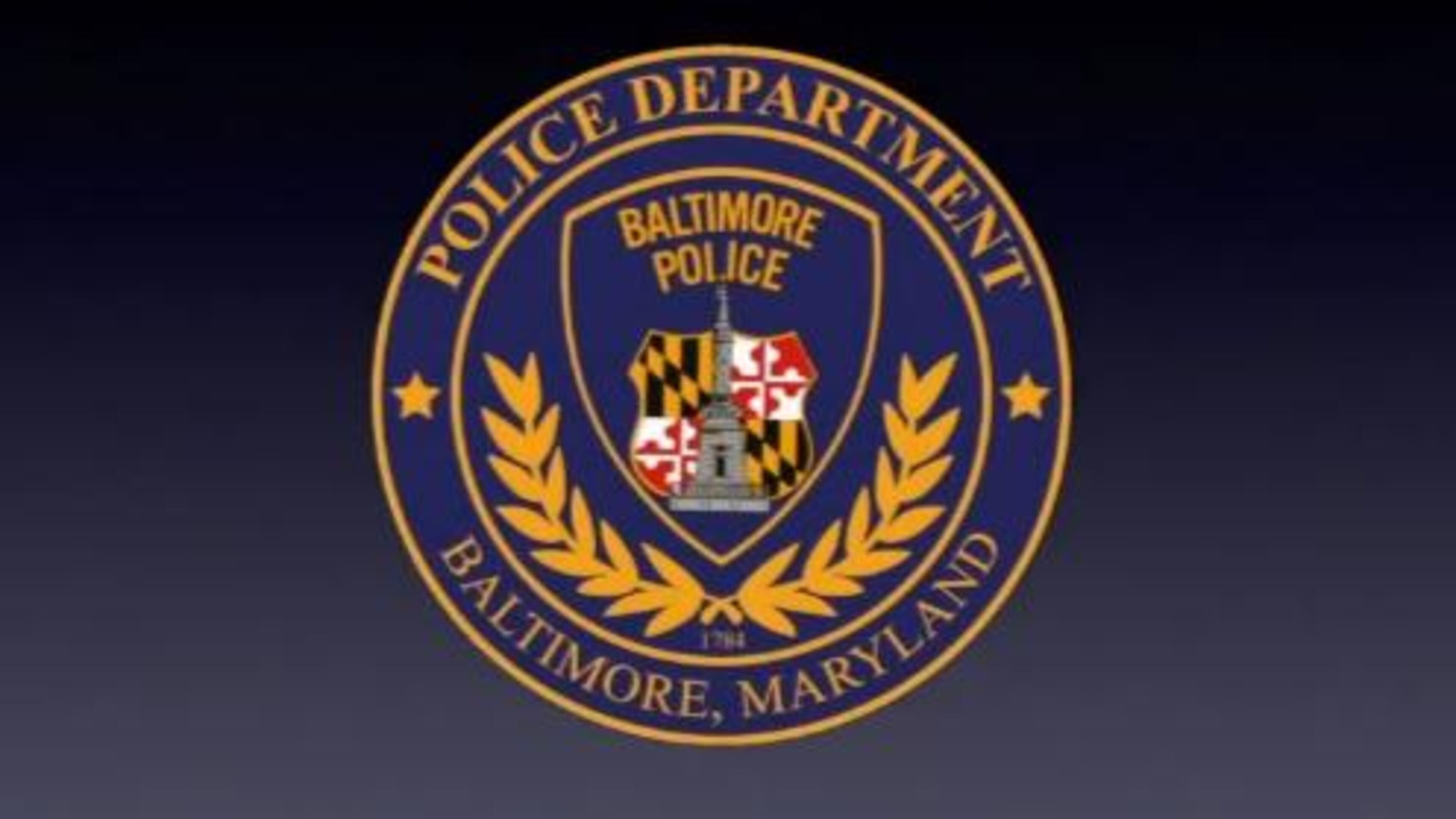 A man was arrested by Baltimore police, who said he shot at them from a minivan Monday night.