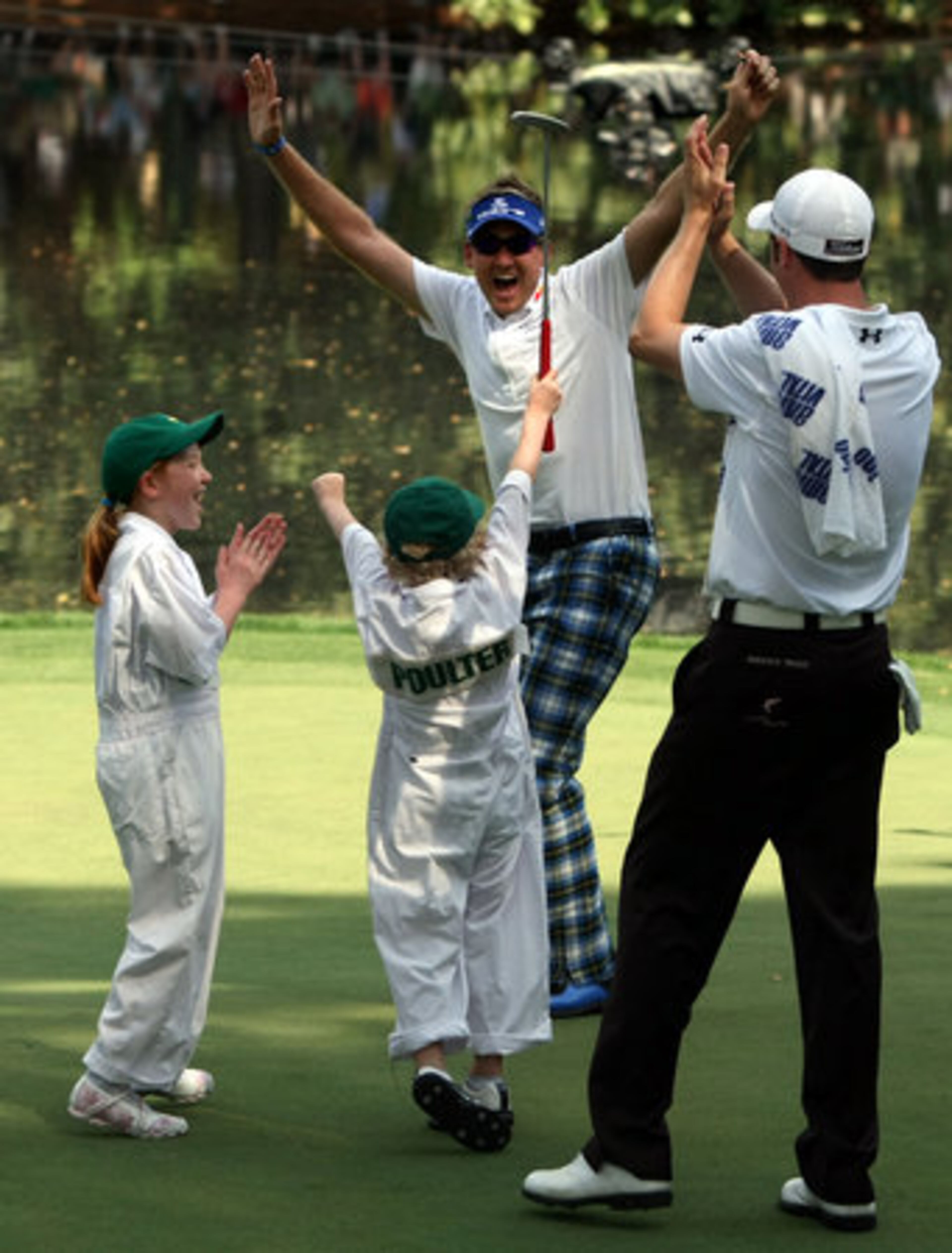 - Ian Poulter, center, celebrates after his son Luke, 5, center, makes a putt for a birdie as his daughter Amy, 8, left, cheers on on the No. 9 green during the Par 3 contest at Augusta National Golf Club Wednesday morning in Augusta, Ga., April 7, 2010.