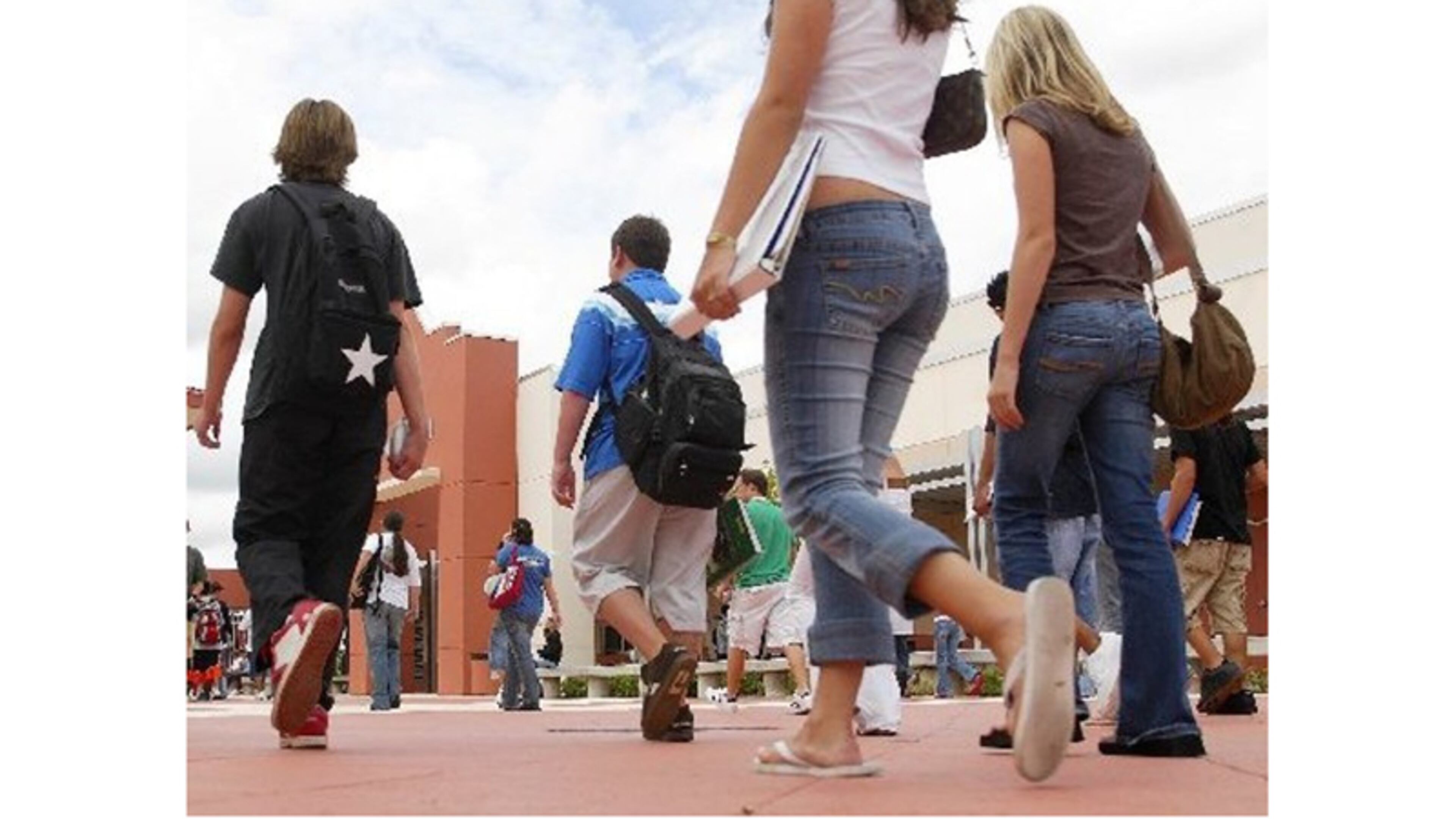 East West Bank will fund an annual $2,500 scholarship to a graduating high school senior as part of a partnership agreement with the Cherokee County School District. AJC FILE