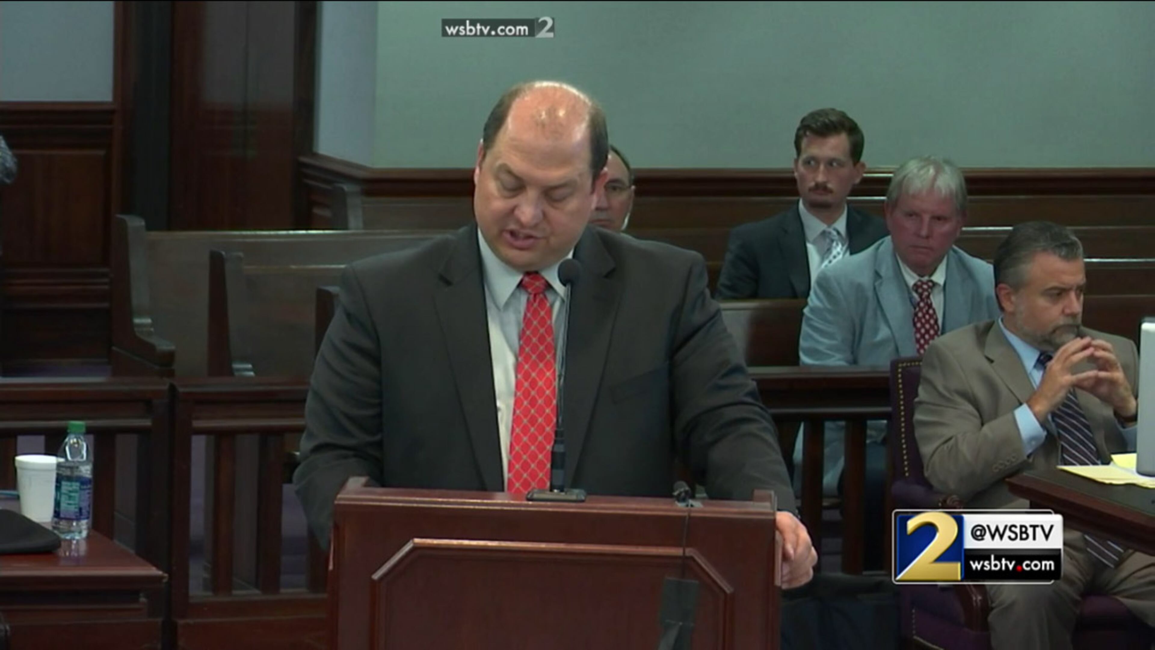 Defense attorney Bryan Lumpkin explains why the defense team for Justin Ross Harris believes it should be able to ask witness Shawn Murphy, a Cobb County detective, about the warrants Murphy obtained for Harris. Judge Mary Staley Clark ruled that Murphy's testimony should be limited so as not to include certain questions about why Harris was considered a criminal suspect. (screen capture via WSB-TV)
