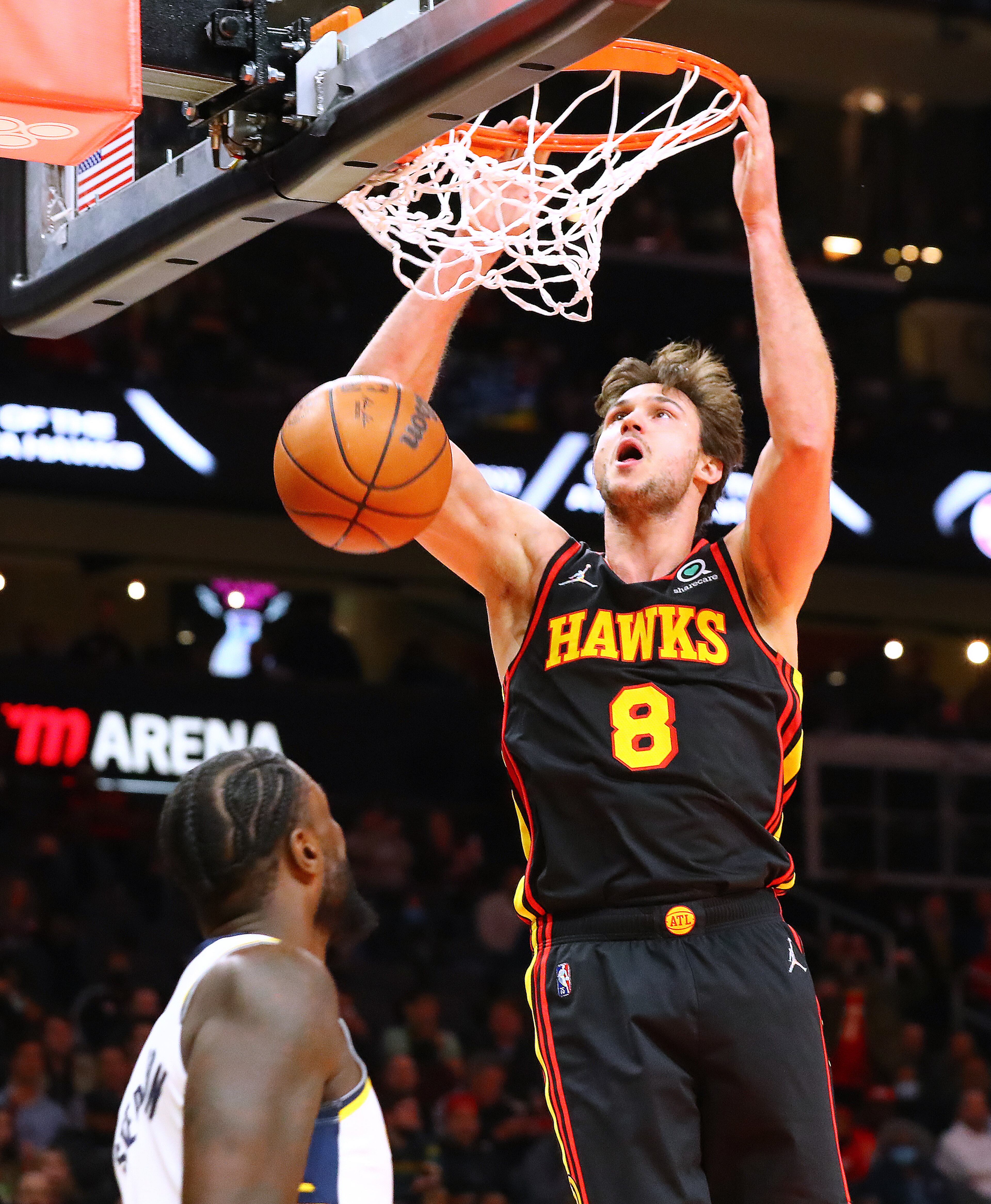 Hawks forward Danilo Gallinari slams for two over Indiana Pacers Lance Stephenson in an NBA game on Tuesday, Feb. 8, 2022, in Atlanta. “Curtis Compton / Curtis.Compton@ajc.com”`