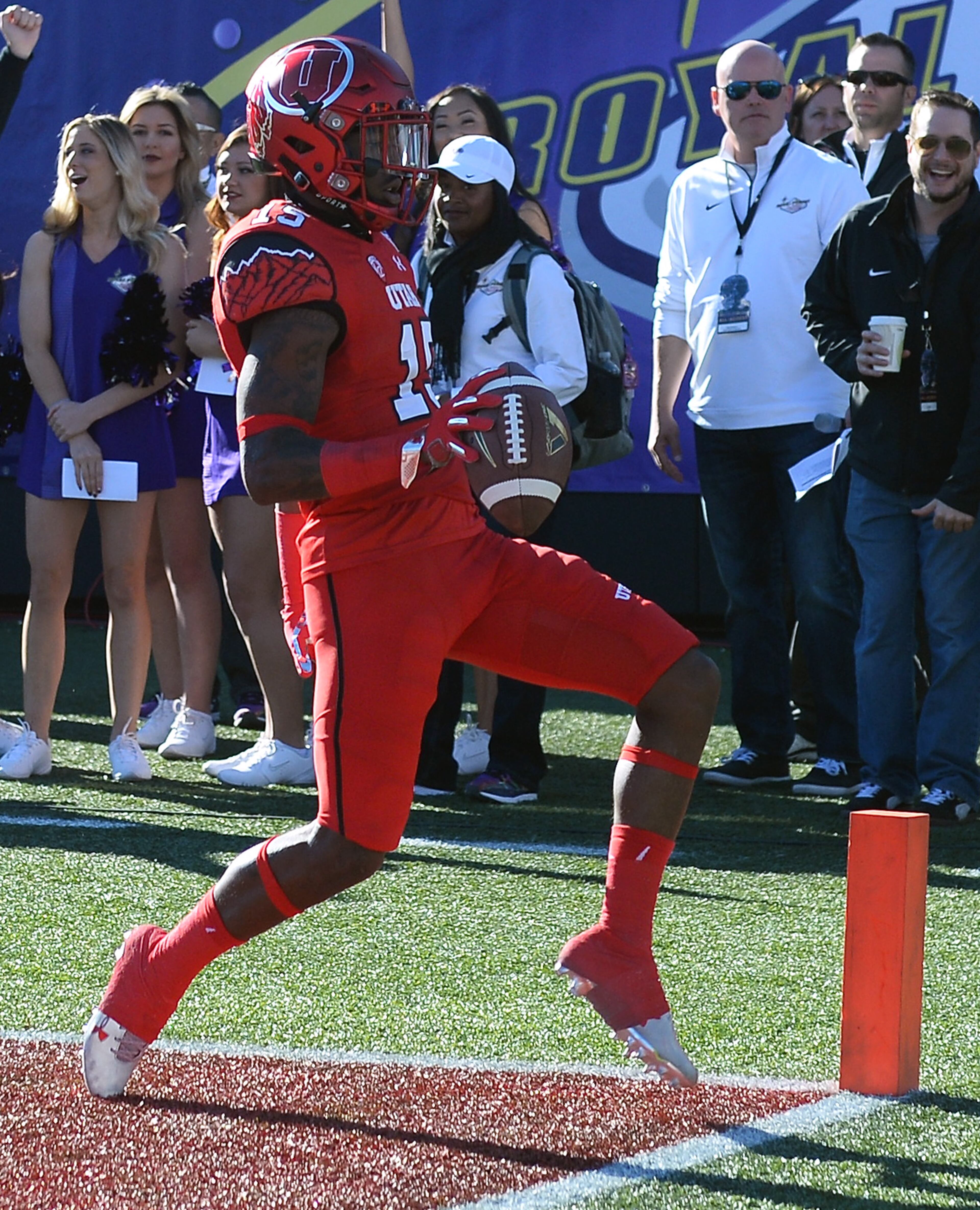 LAS VEGAS, NV - DECEMBER 19: Defensive back Dominique Hatfield #15 of the Utah Utes scores a touchdown after intercepting a pass against the Brigham Young Cougars during the Royal Purple Las Vegas Bowl at Sam Boyd Stadium on December 19, 2015 in Las Vegas, Nevada. (Photo by Ethan Miller/Getty Images)
