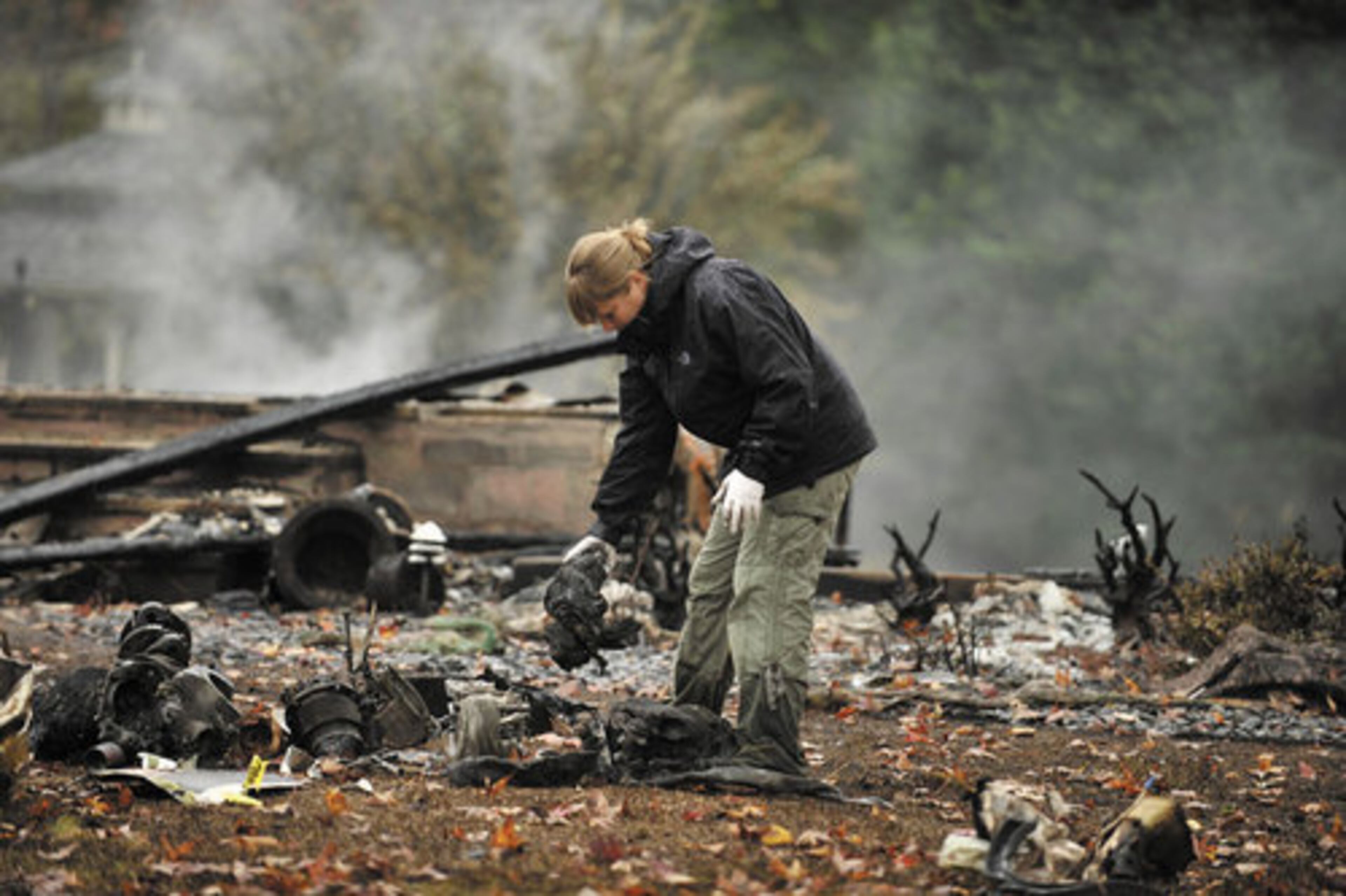 NTSB investigators on Saturday combed through the wreckage of a plane crash in Lawrenceville from the previous day.