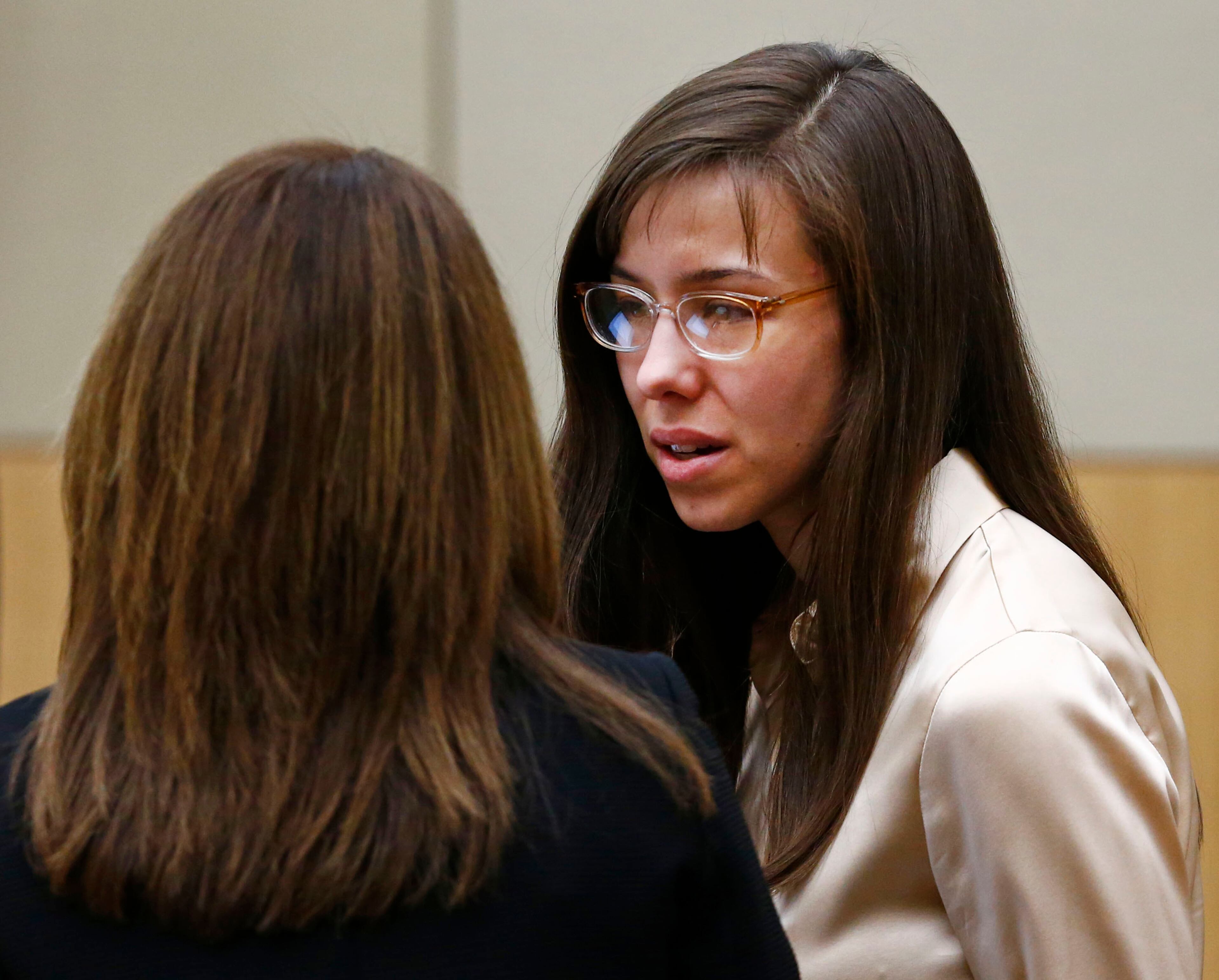 Jodi Arias talks to her defense attorney Jennifer Wilmott as the jury begins deliberation whether there was an aggravating factor in the murder of Travis Alexander on May 15, 2013, during the sentencing phase of her trial at Maricopa County Superior Court in Phoenix. If the jury finds aggravating factors in her crime, Arias could be sentenced to death.