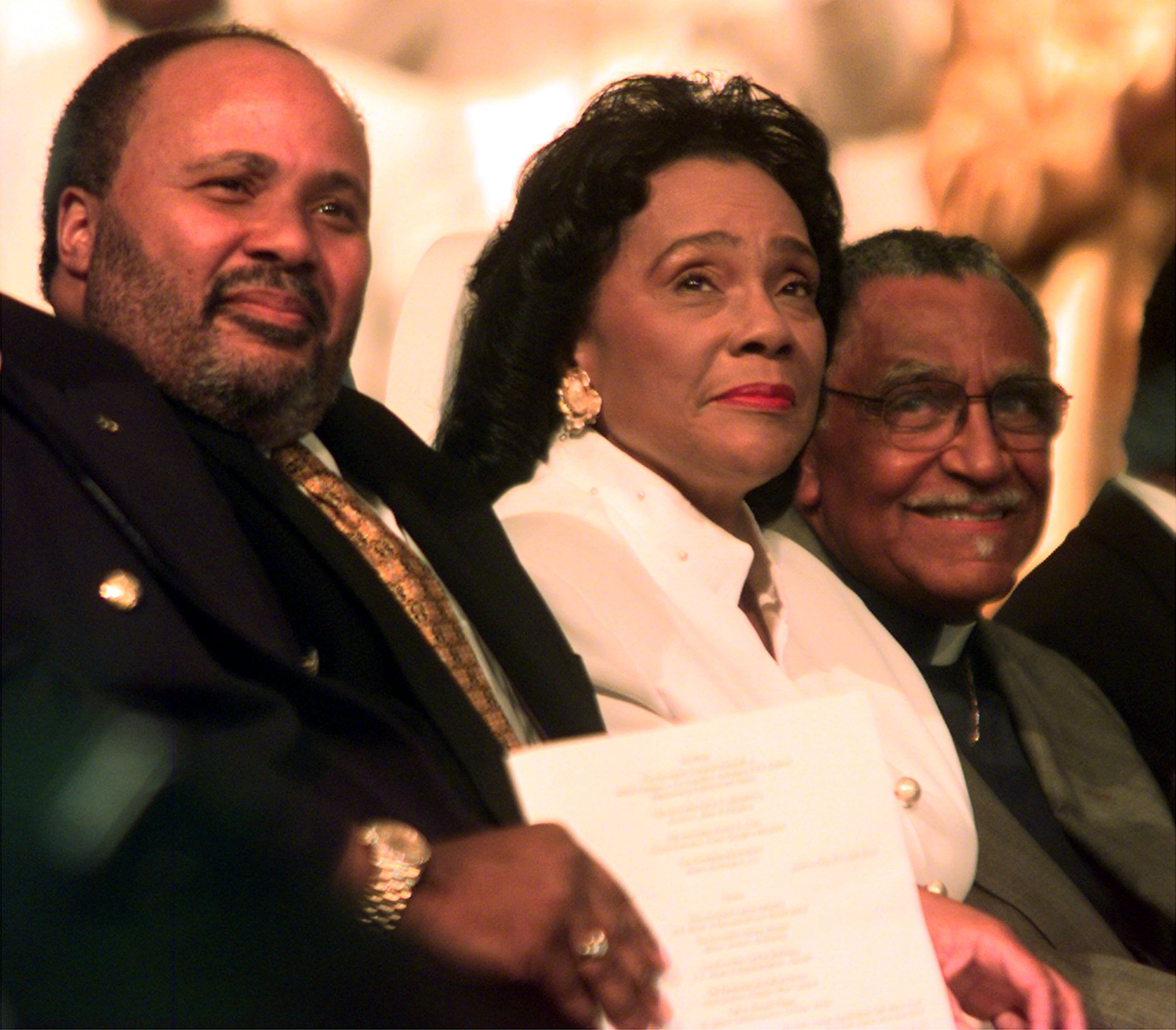 Lowery (right) sits with Martin Luther King III (left) and Coretta Scott King at the Jericho City of Praise church Saturday during the inauguration celebration for President Bill Clinton in 1993. (Photo by Rick McKay/Washington Bureau)