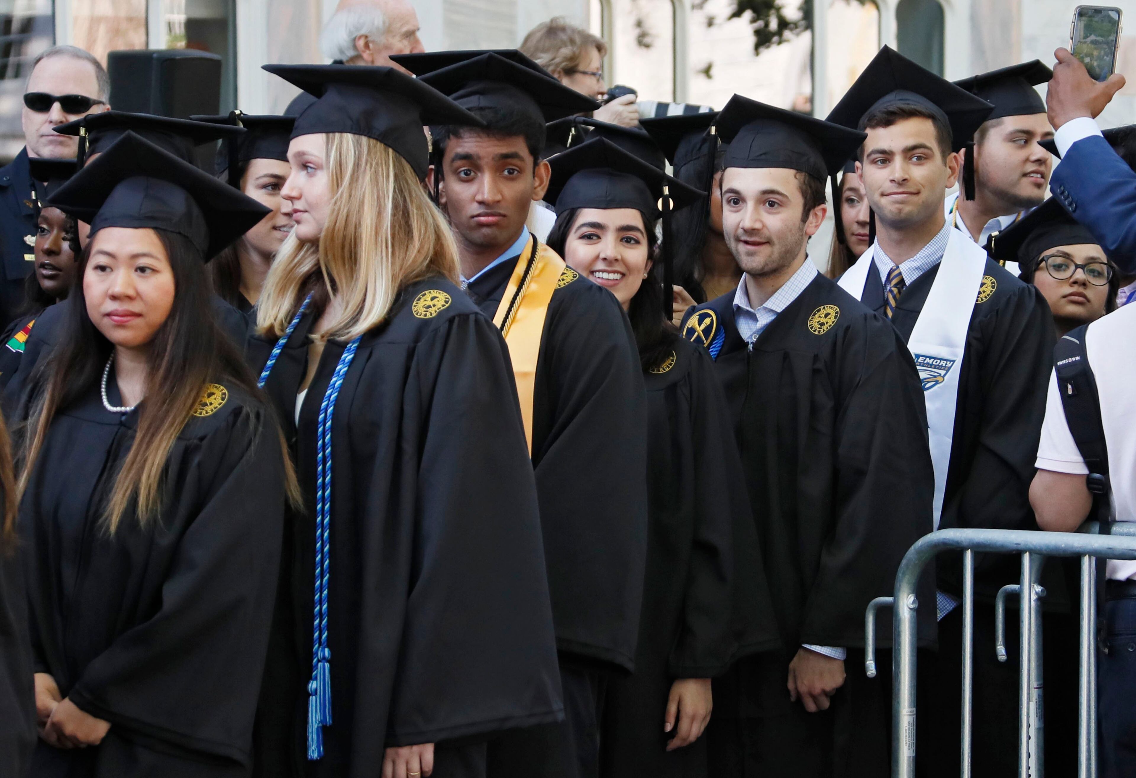 Graduates faces display a variety of emotions as they enter the quad during the processional. Claire E. Sterk, the university's 20th president, presided over the 174th commencement exercises on Monday, May 13, 2019. Andrew Young, former Atlanta mayor and civil rights activist, delivered the keynote address. Bob Andres / bandres@ajc.com