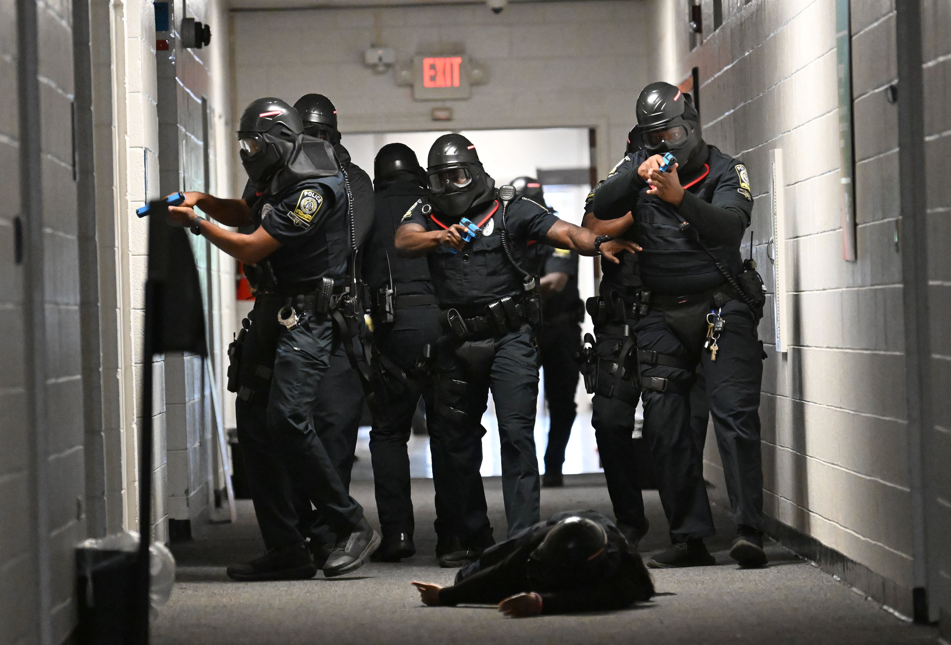 Atlanta Public Schools’ new tactical team conducts a training scenario demonstration for members of the media at Atlanta Public Schools’ Brewer Training Center on Tuesday, July 21, 2026, in Atlanta. Atlanta Public Schools is adding two new units to its security apparatus to keep students and employees safe: a tactical team and a drone team. (Hyosub Shin/AJC)