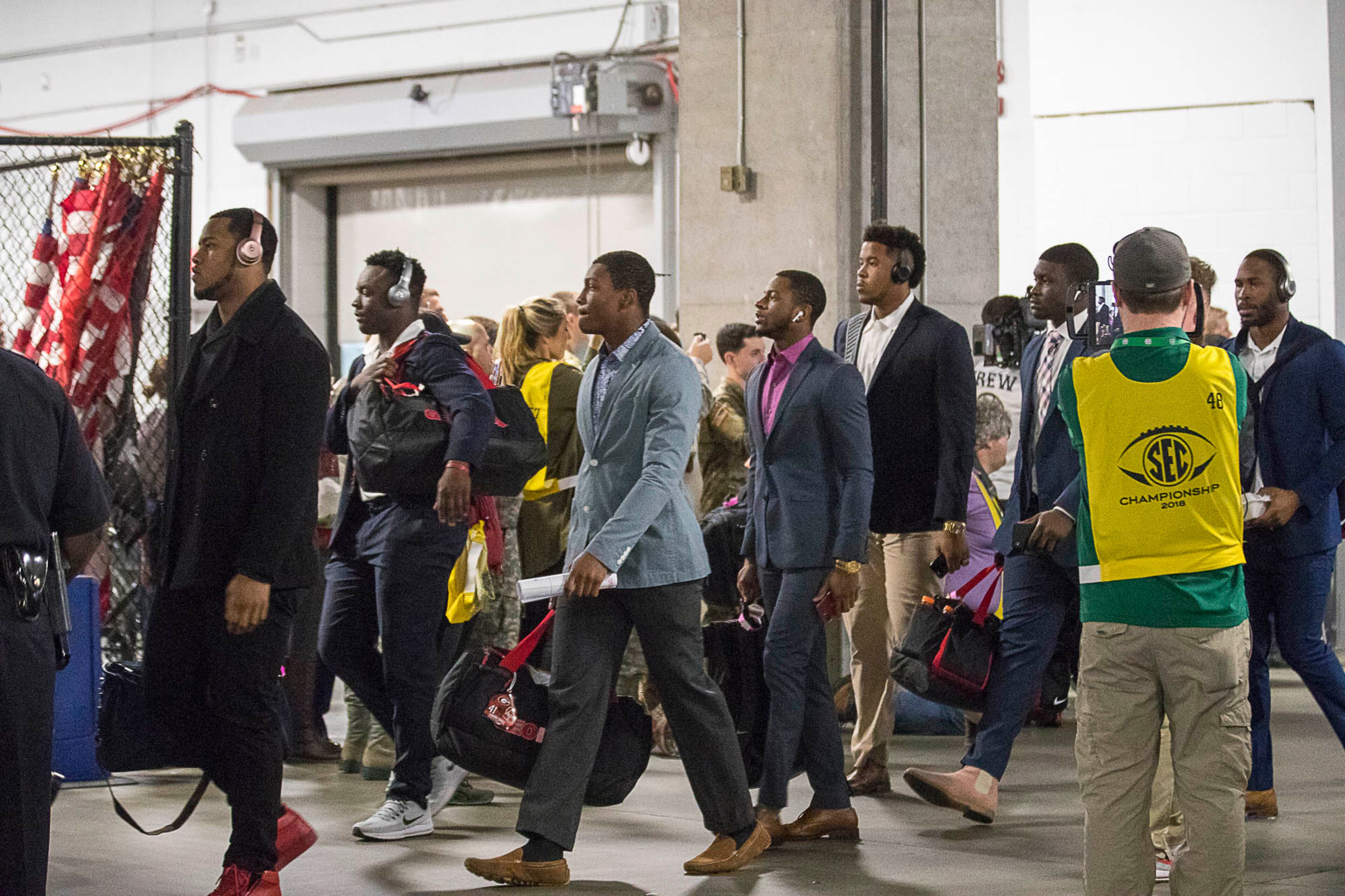 12/01/2018 -- Atlanta, Georgia -- The Georgia Bulldogs arrive at Mercedes-Benz Stadium before the start of the SEC Championship game in Atlanta, Saturday, December 1, 2018. Georgia will play Alabama for the title. (ALYSSA POINTER/ALYSSA.POINTER@AJC.COM)