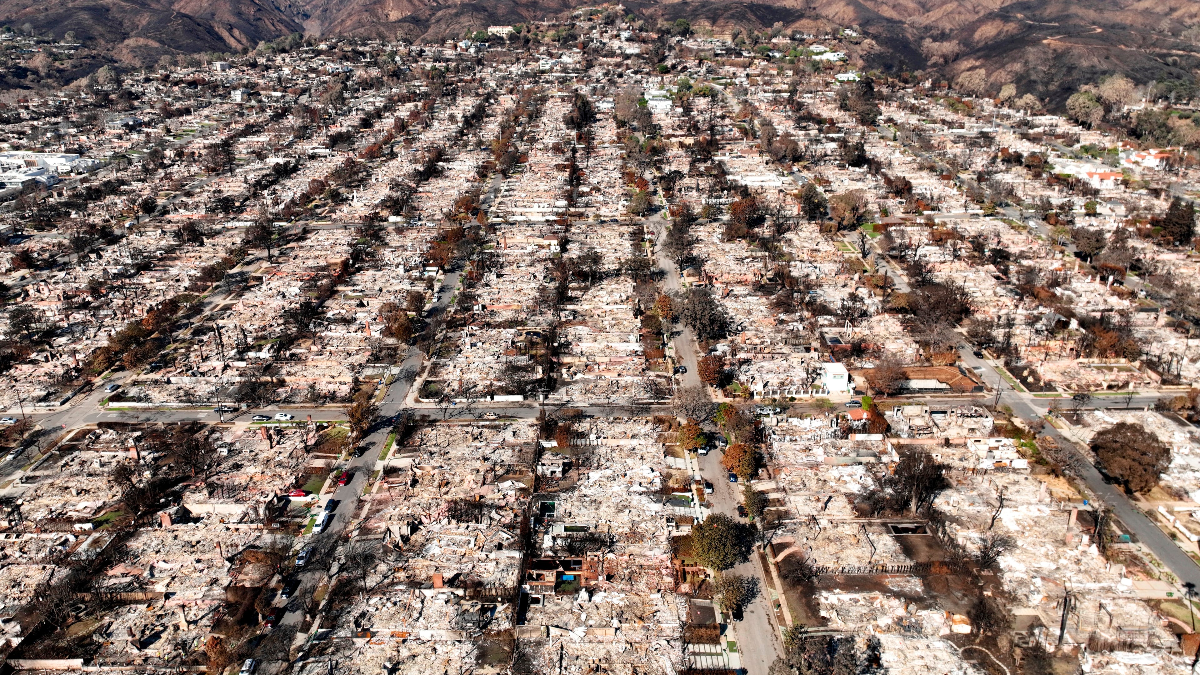 FILE - The devastation from the Palisades Fire is shown in an aerial view of the Pacific Palisades neighborhood of Los Angeles, Monday, Jan. 27, 2025. (AP Photo/Jae C. Hong, File)