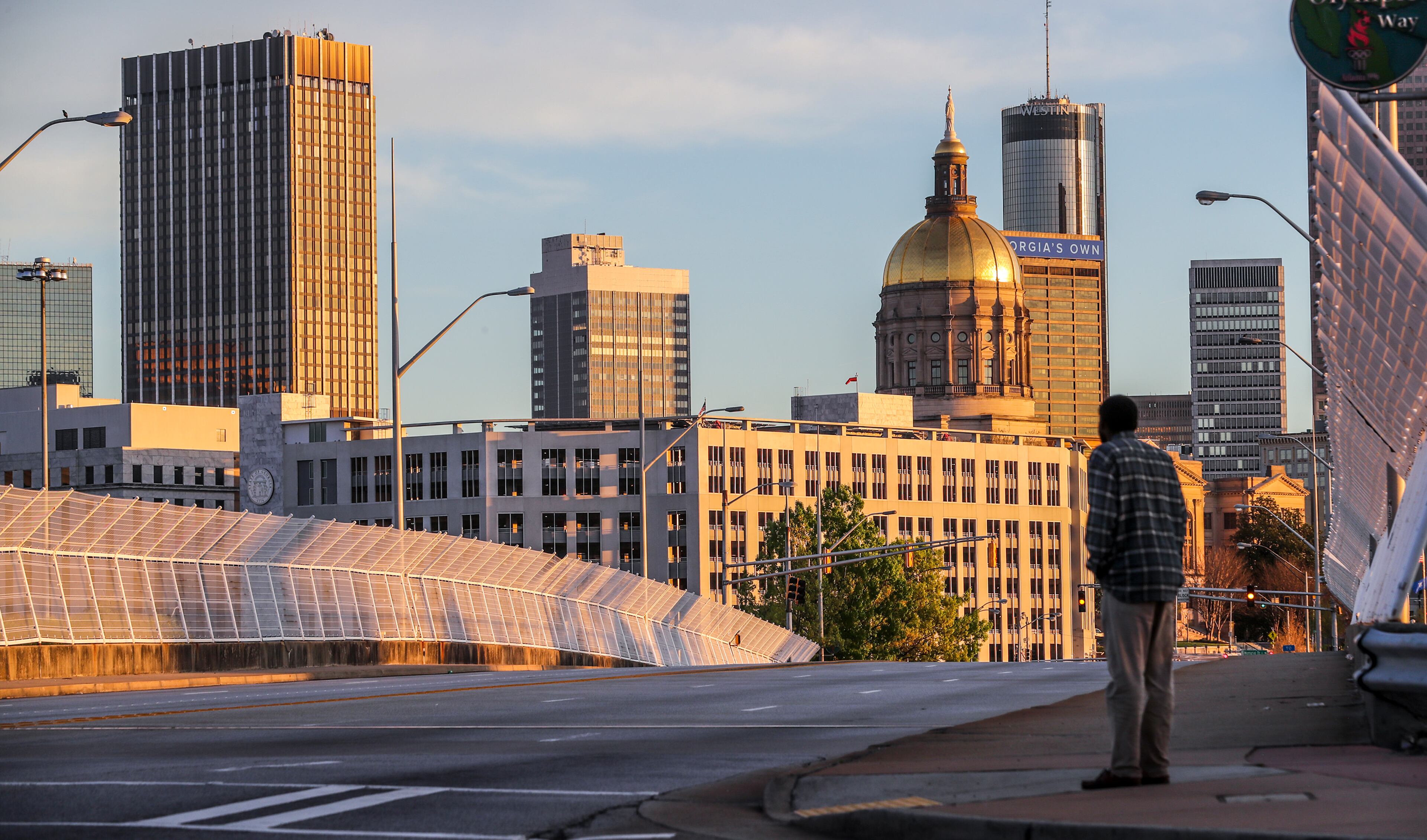 March 26, 2020 Atlanta: The street was practically empty of traffic on Capitol Avenue and I-20 on Thursday, March 26, 2020. The impact of the coronavirus in Georgia was evident everywhere on Thursday, March 26, 2020 - from less traveled streets, public service billboards and people staying home. Dr. Kathleen Toomey, the state public health commissioner, says the State of Georgia has several “hotspots” of outbreaks, including in Albany, Bartow County, Dublin and Rome. In “virtually all these cases,” at least some of the spread was linked to “large church services,” she said. In Dougherty County, for instance, the coronavirus outbreak has been traced to two funeral services in late February and early March. Toomey told clergy that churches, synagogues and mosques that have the technical capacity to offer online services should do so. “This is a short period of inconvenience and worry, but if we invest in this collectively as a community we can help stop this virus,” she said. JOHN SPINK/JSPINK@AJC.COM