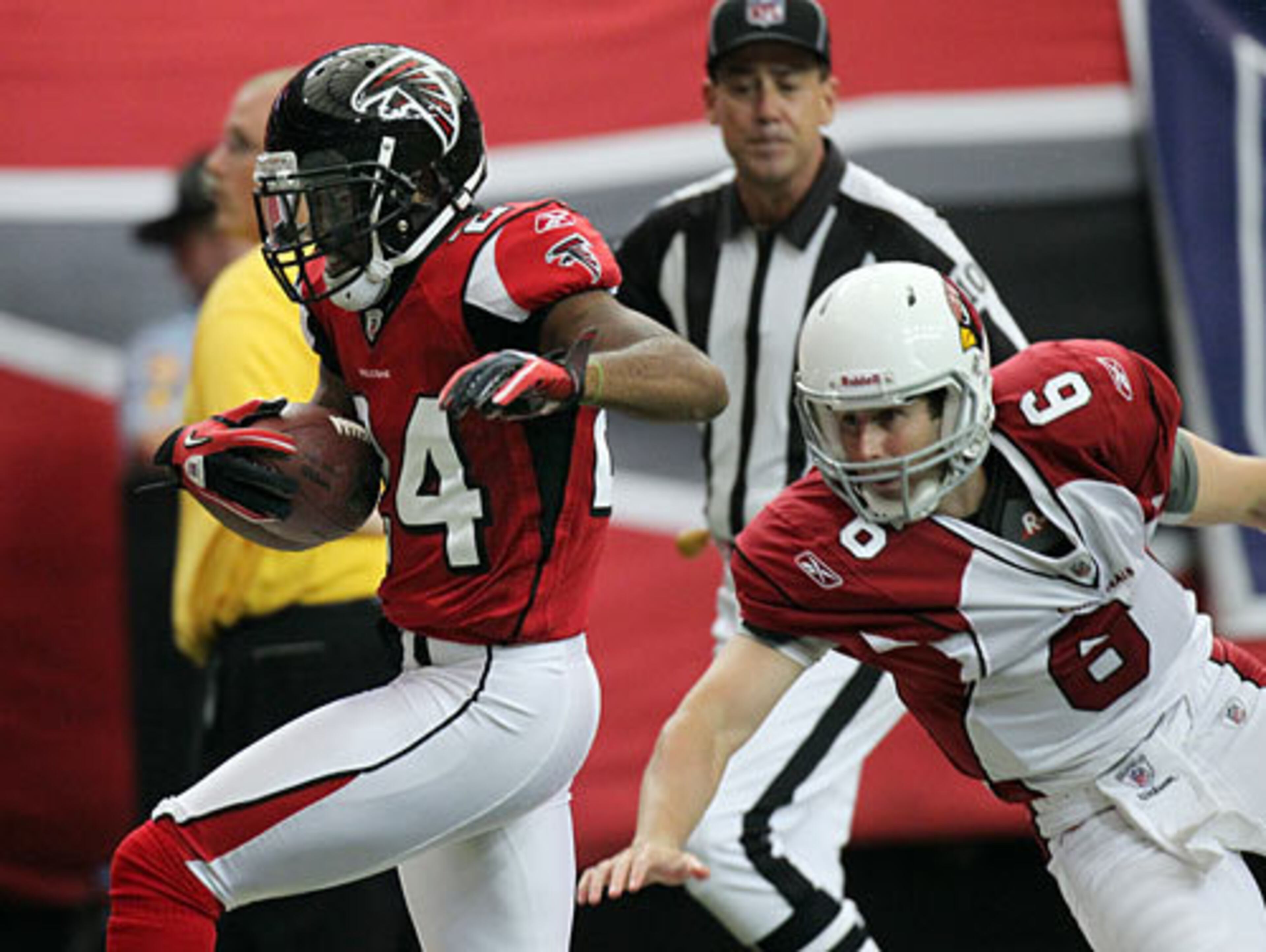 Falcons cornerback Dominique Franks intercepts a pass by Arizona Cardinals backup quarterback Max Hall (6), who saves the touchdown by knocking Franks out of bounds just short of the end zone during 4th quarter action.