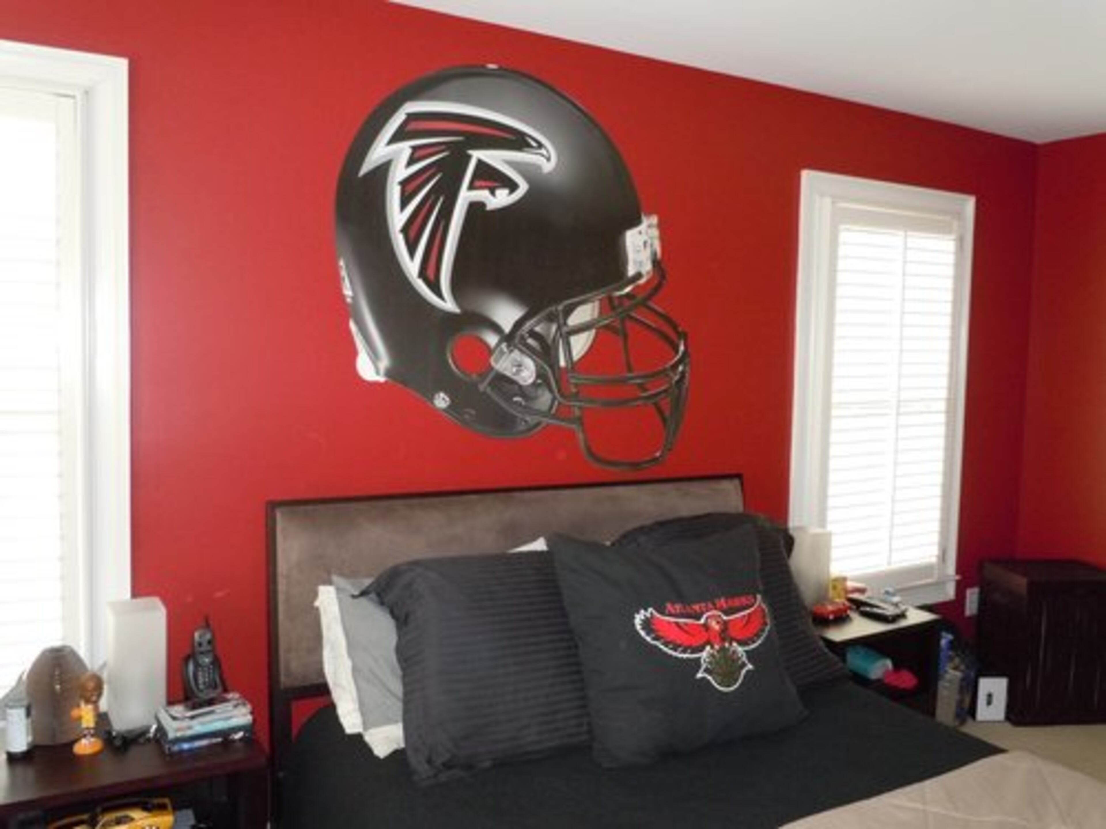 Jamie Dearing, 14, is a sports fan. His mother ordered the Atlanta Falcons wall decal for his bedroom from www.fathead.com.