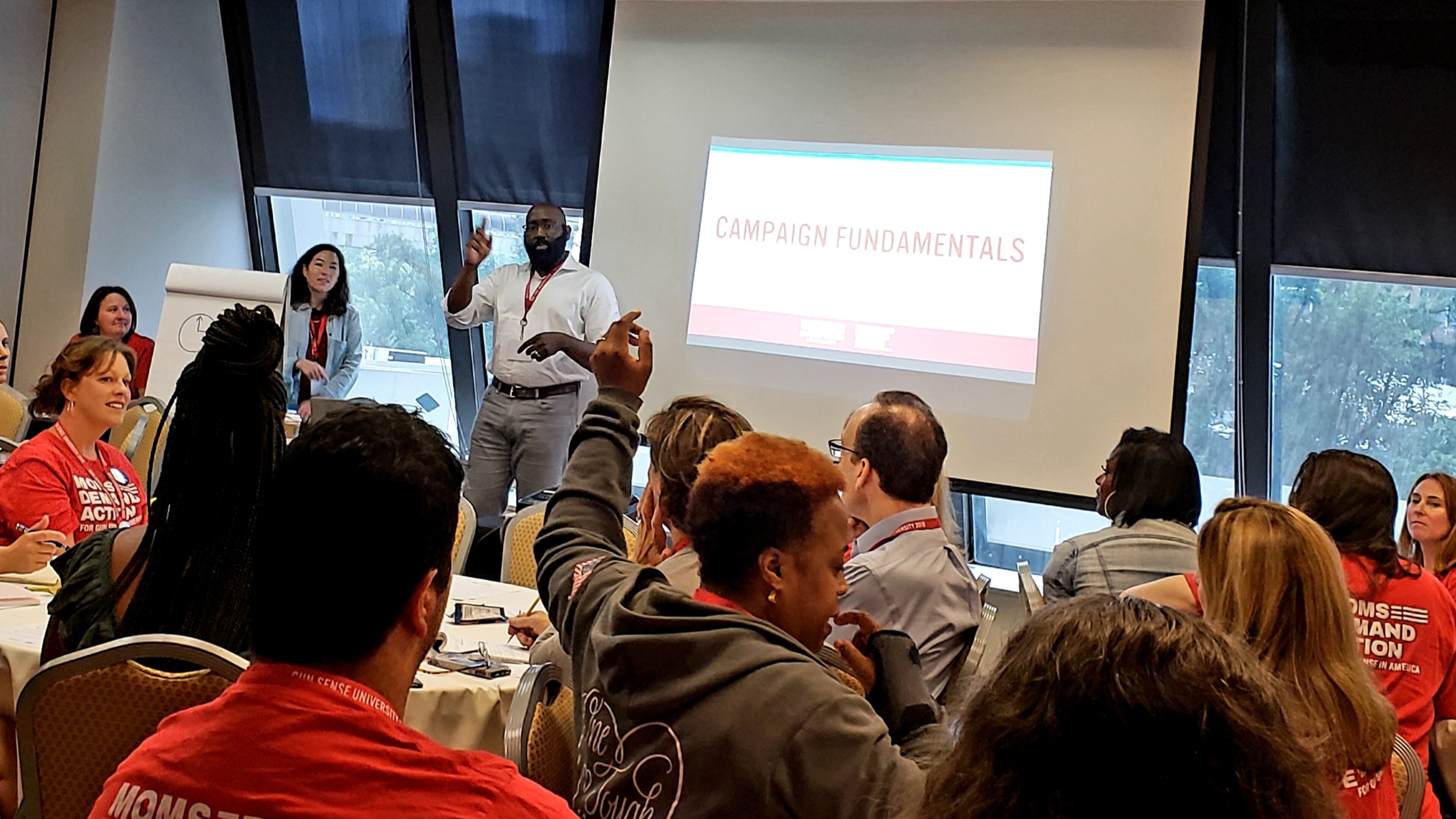 Marlon Marshall, the founder of the campaign consulting firm 270 Strategies, leads a “Running for Office 101” training session Friday during the Moms Demand Action “Gun Safety University” conference in Atlanta. Maya T. Prabhu/maya.prabhu@ajc.com
