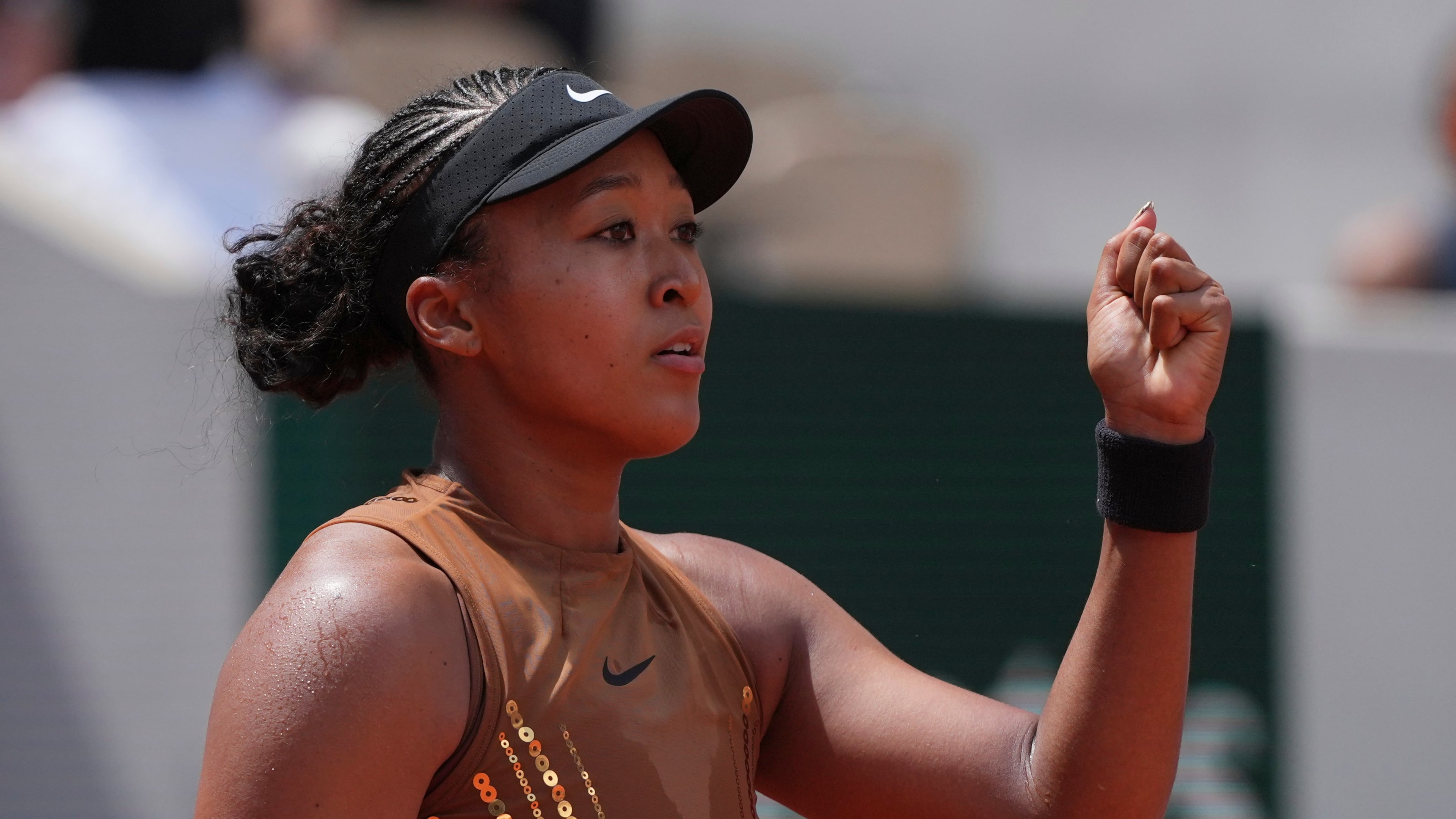 Naomi Osaka of Japan celebrates winning the third round women's singles tennis match against against Iva Jovic of the U.S. at the French Open tennis tournament in Paris, Saturday, May 30, 2026. (AP Photo/Thibault Camus)