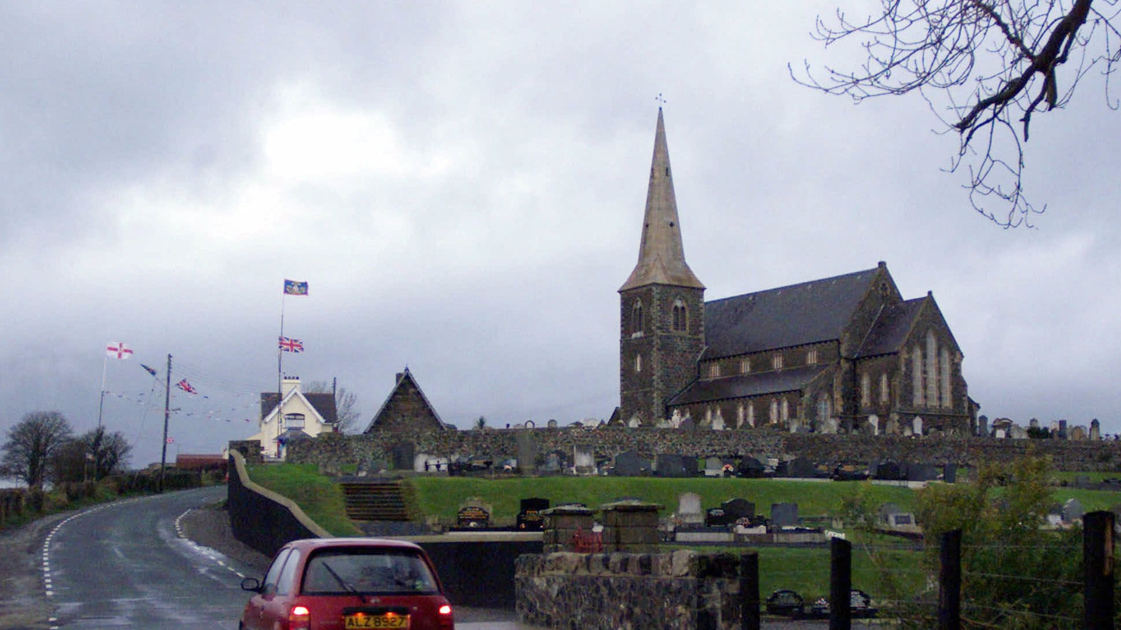 FILE - The often barricaded Protestant church of Drumcree stands alone near the town of Portadown, Thursday, Dec. 2, 1999. (AP Photo/Adam Butler, File)