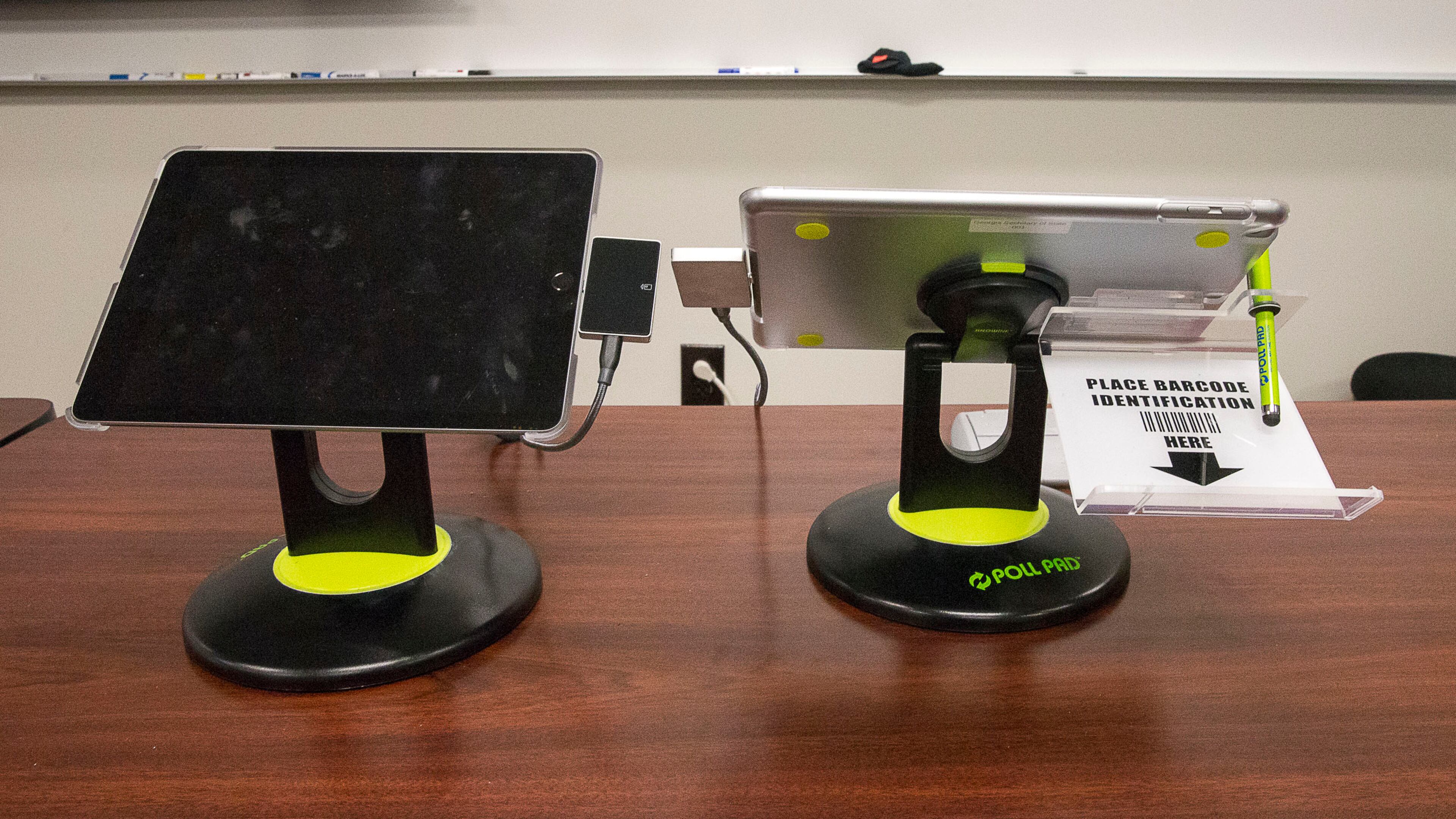 Voters check in at their precincts with an iPad that scans their driver's license or other form of photo ID when using the new Georgia voting machines, as shown at a demonstration at the James H. "Sloppy" Floyd building in Atlanta, Sept. 16, 2019. (Alyssa Pointer/alyssa.pointer@ajc.com)