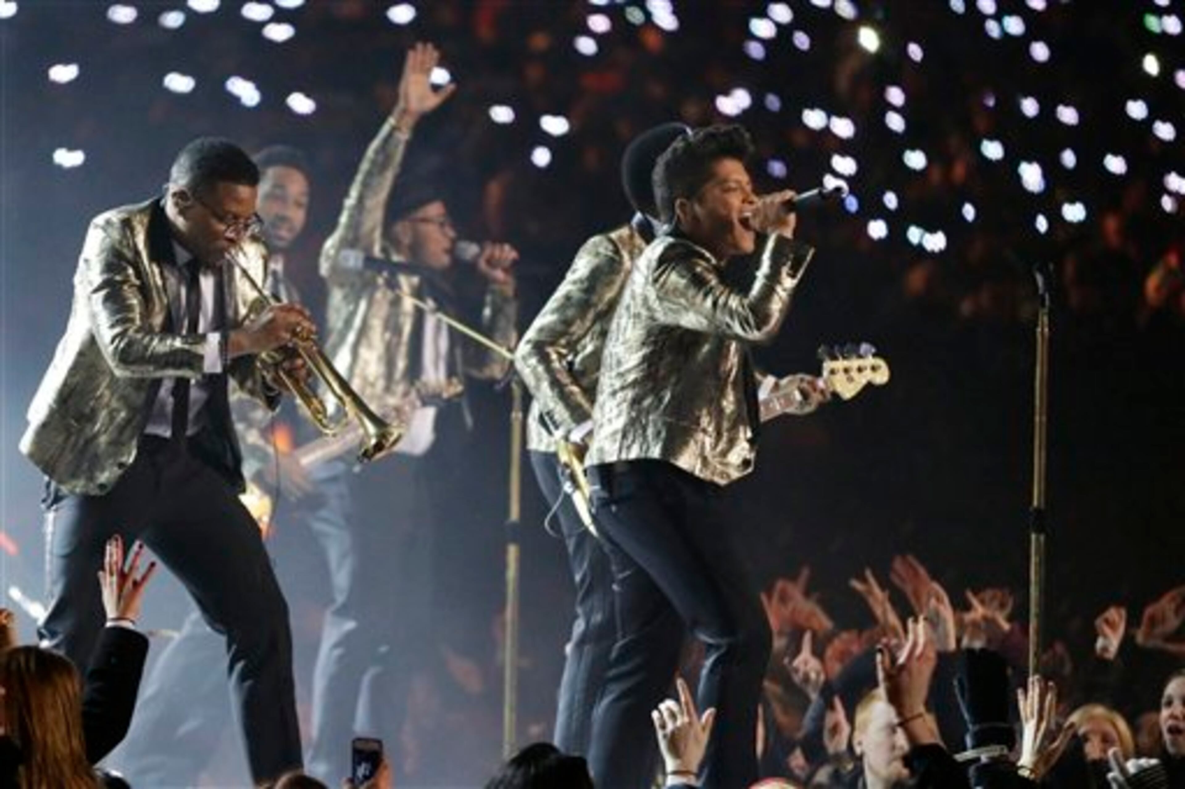 Bruno Mars performs during the halftime show of the NFL Super Bowl XLVIII football game Sunday, Feb. 2, 2014, in East Rutherford, N.J. (AP Photo/Julio Cortez)