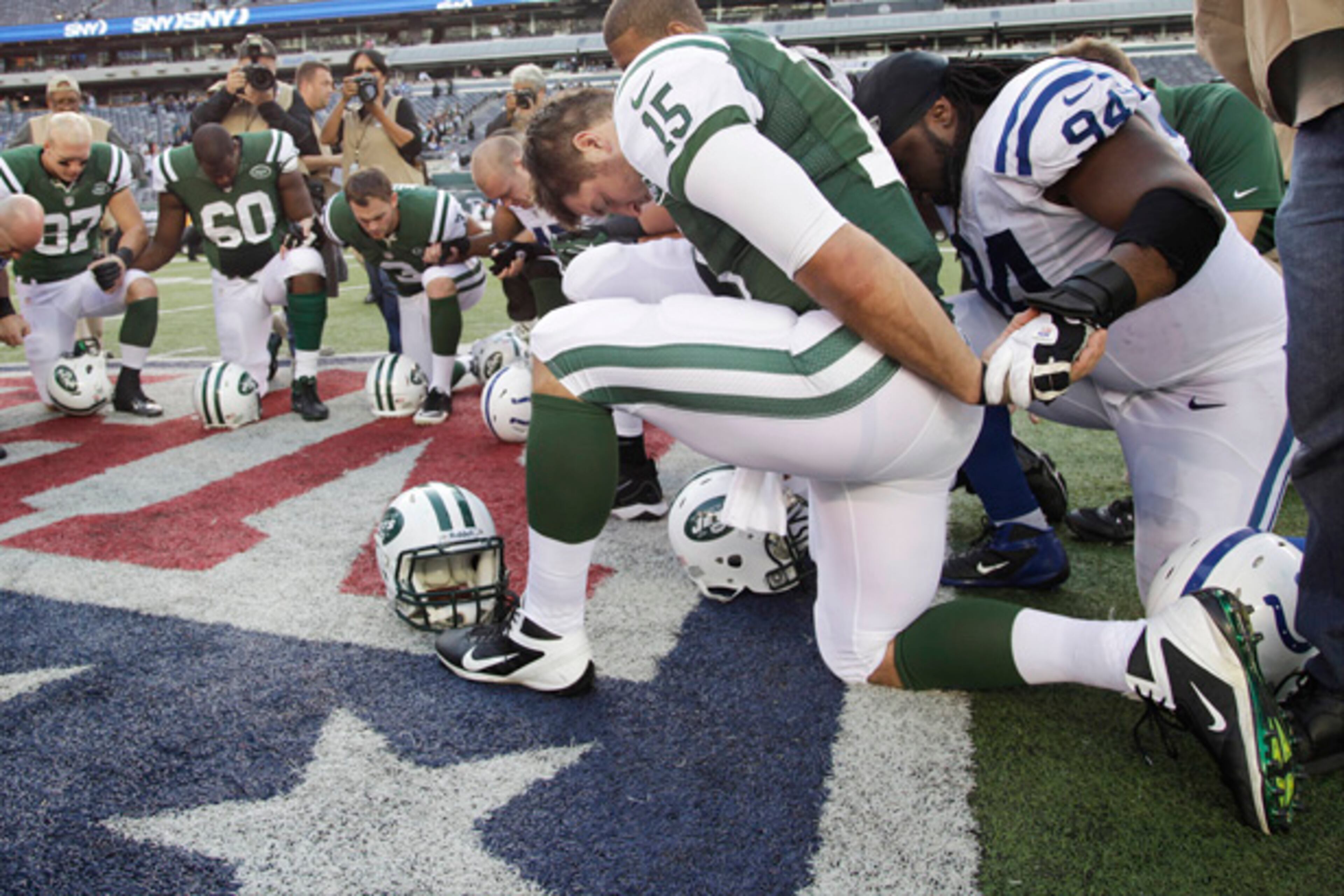 Prayer after a game is nothing new. But when the NFL most outward Christian kneels down, it's more noticable.