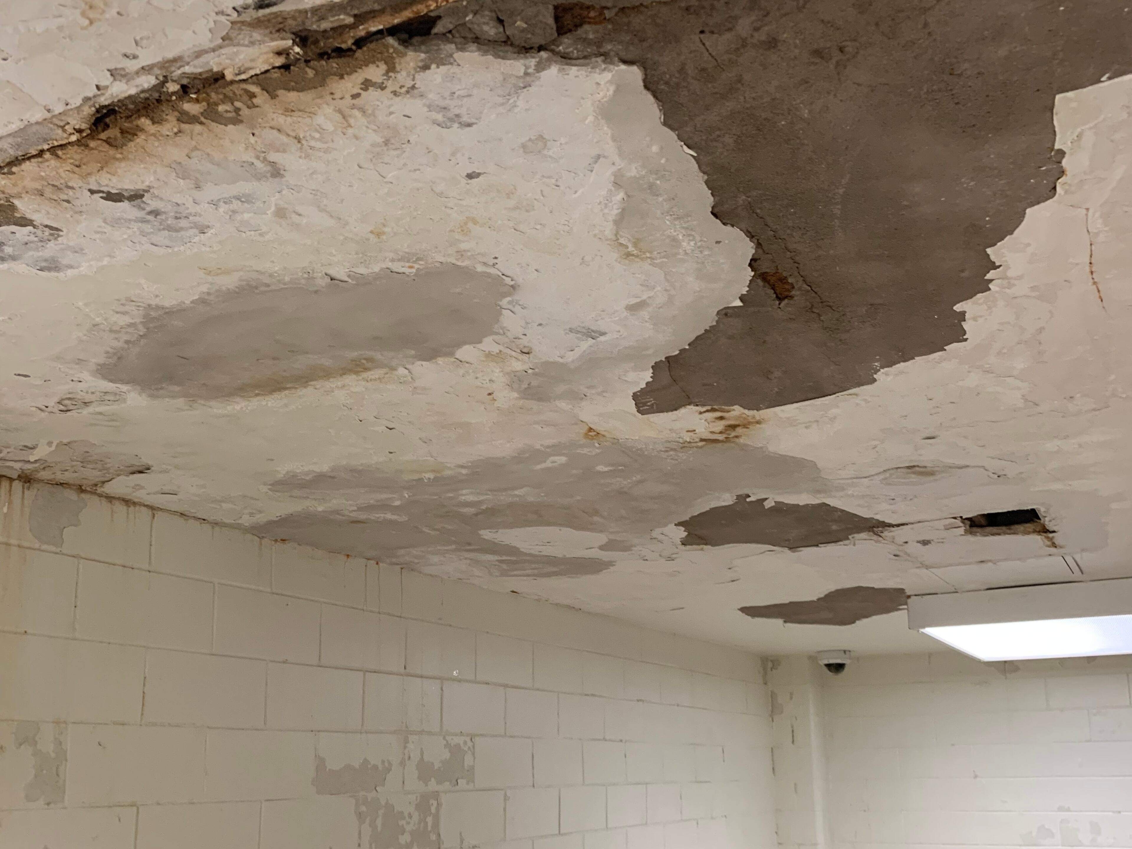 A plaster ceiling at Druid Hills High before it was repaired. After community outcry and state intervention over conditions at the school, the DeKalb County School District began repairs at the school this summer.