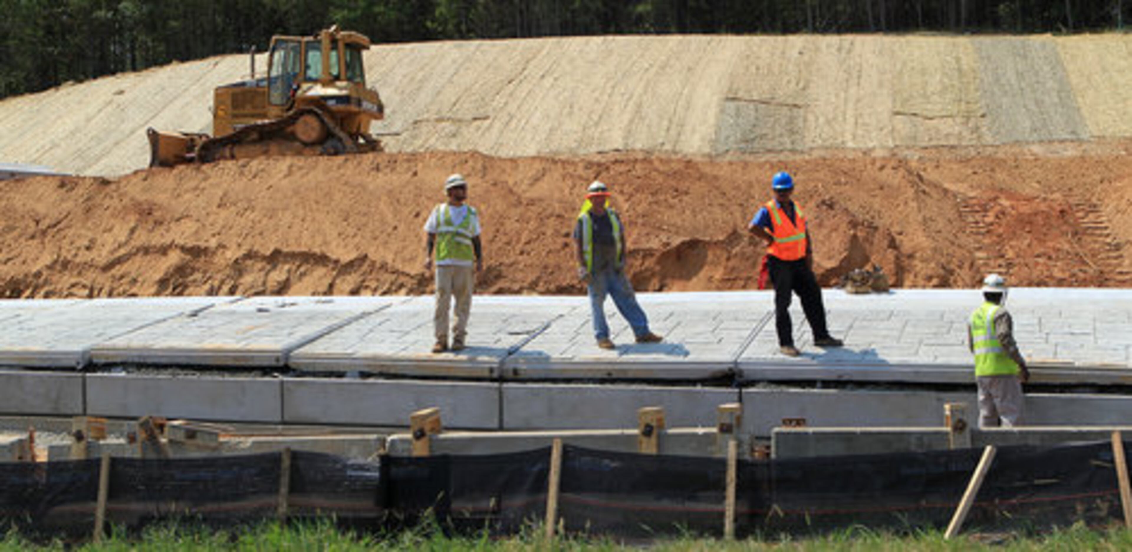 Work on the interchange, which is north of the Towne Lake interchange at Ridgewalk Road, began in February and is expected to be completed by December 2012.