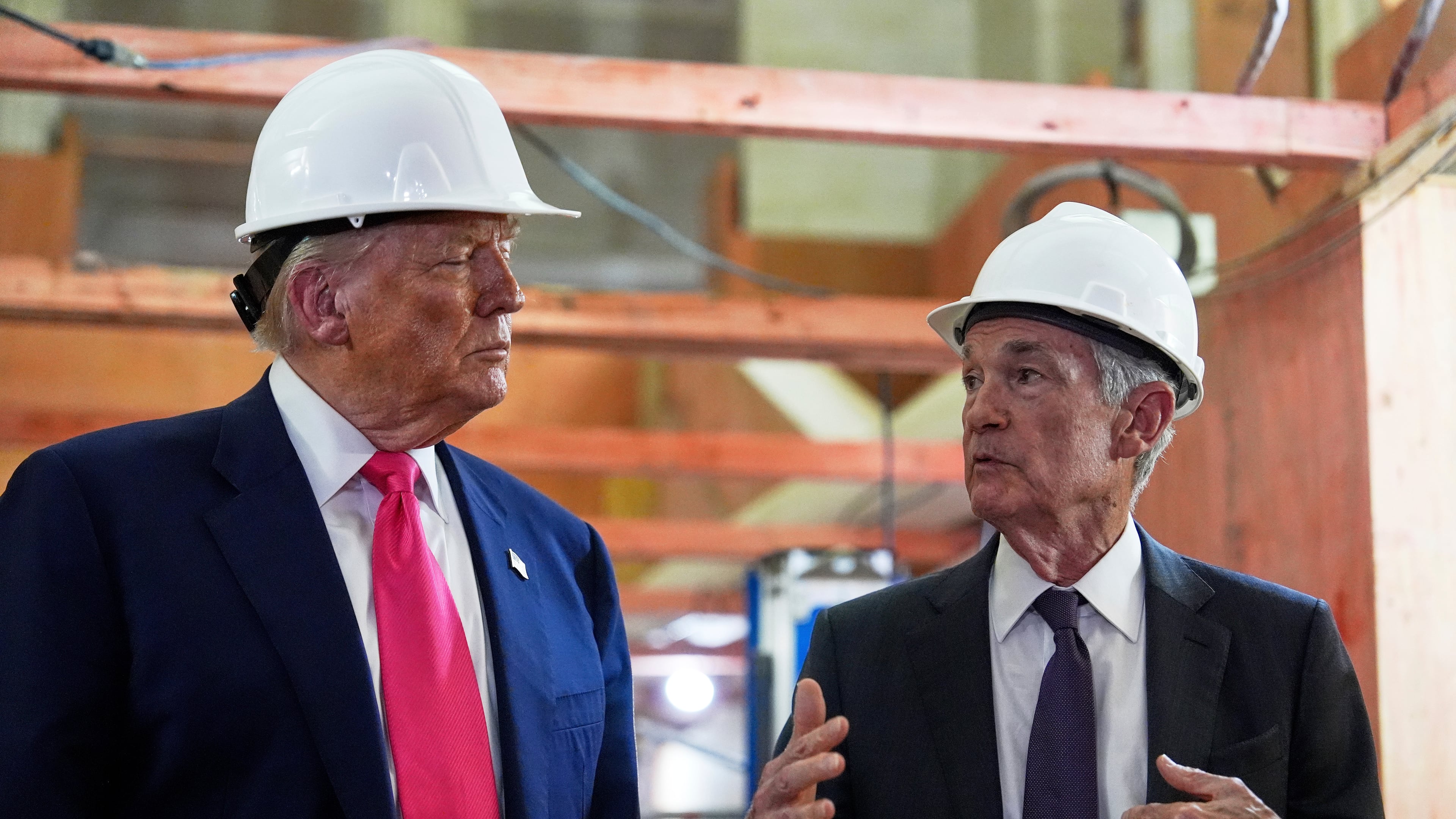 FILE - President Donald Trump listens to Federal Reserve Chairman Jerome Powell speak during a visit to the Federal Reserve, July 24, 2025, in Washington. (AP Photo/Julia Demaree Nikhinson, File)