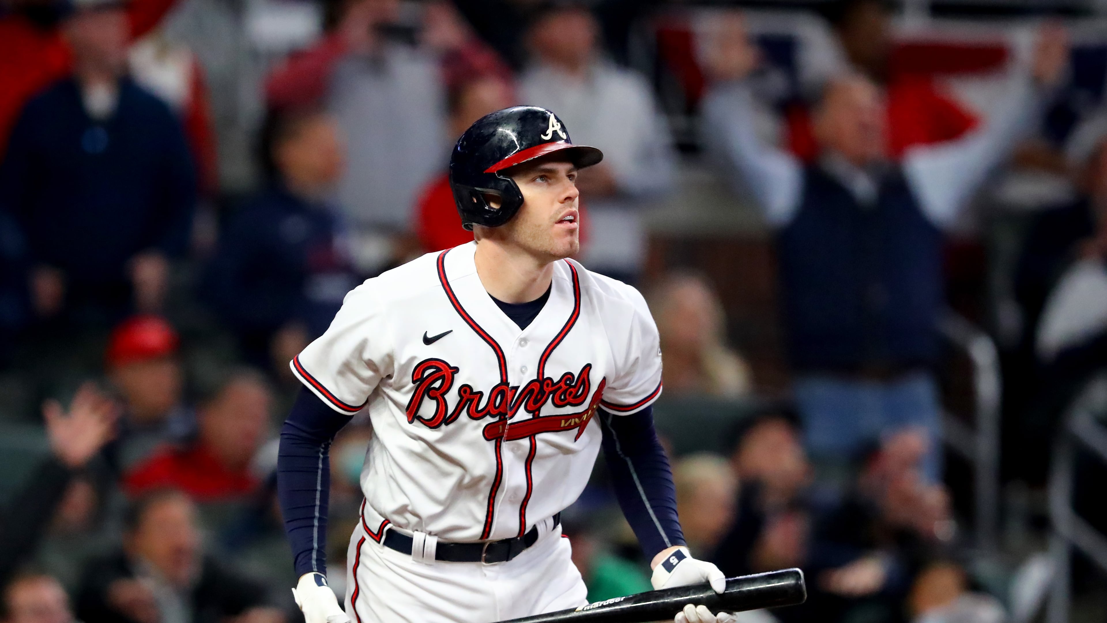 First baseman Freddie Freeman, pictured during the 2021 World Series with the Braves, has over 2,500 hits and is approaching 400 home runs in his career. The looming debate is whether he would represent the Braves or Dodgers – or neither – on a Hall of Fame plaque. (Curtis Compton/AJC)