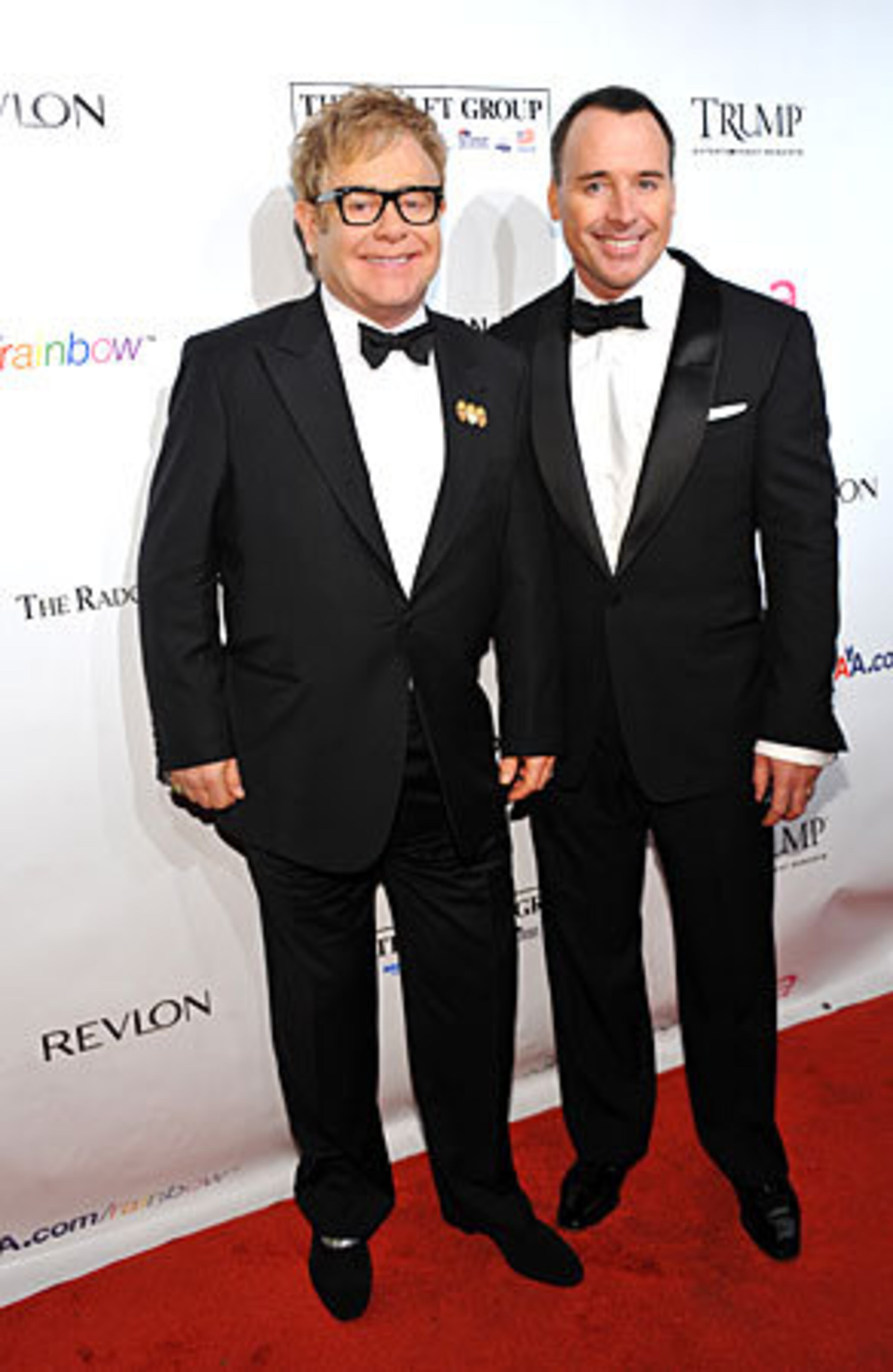 Sir Elton John, left, and husband David Furnish.