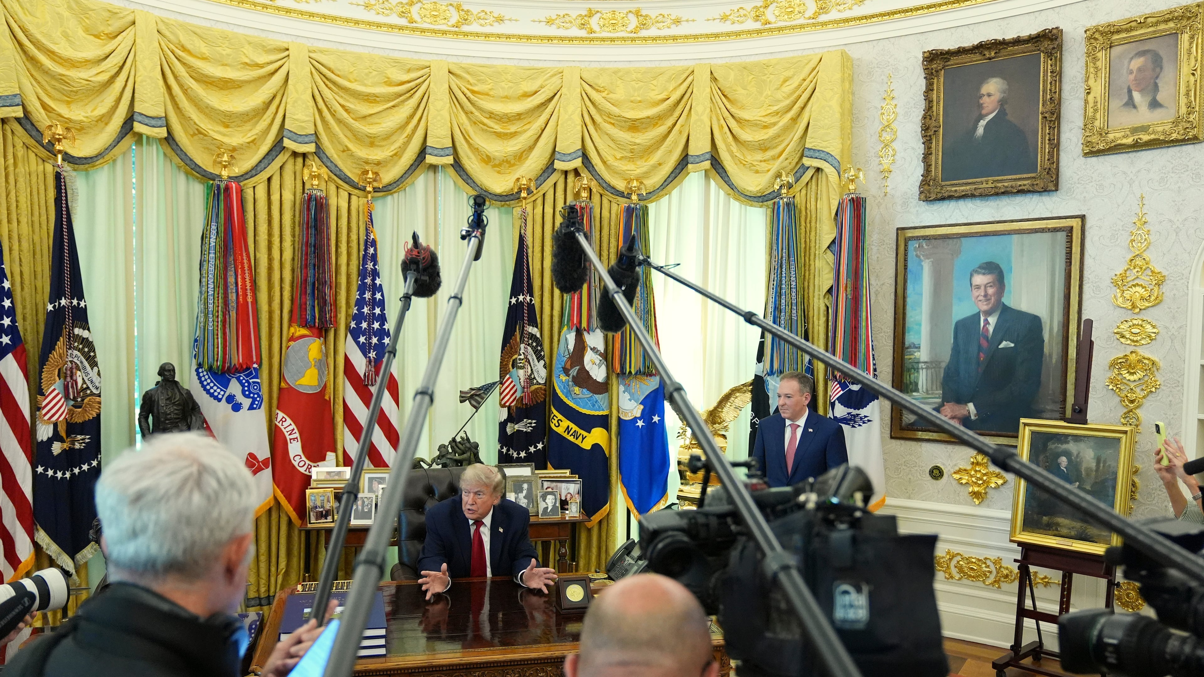 President Donald Trump speaks to reporters as Environmental Protection Agency administrator Lee Zeldin listens in the Oval Office of the White House, Monday, June 29, 2026, in Washington. (AP Photo/Jacquelyn Martin)