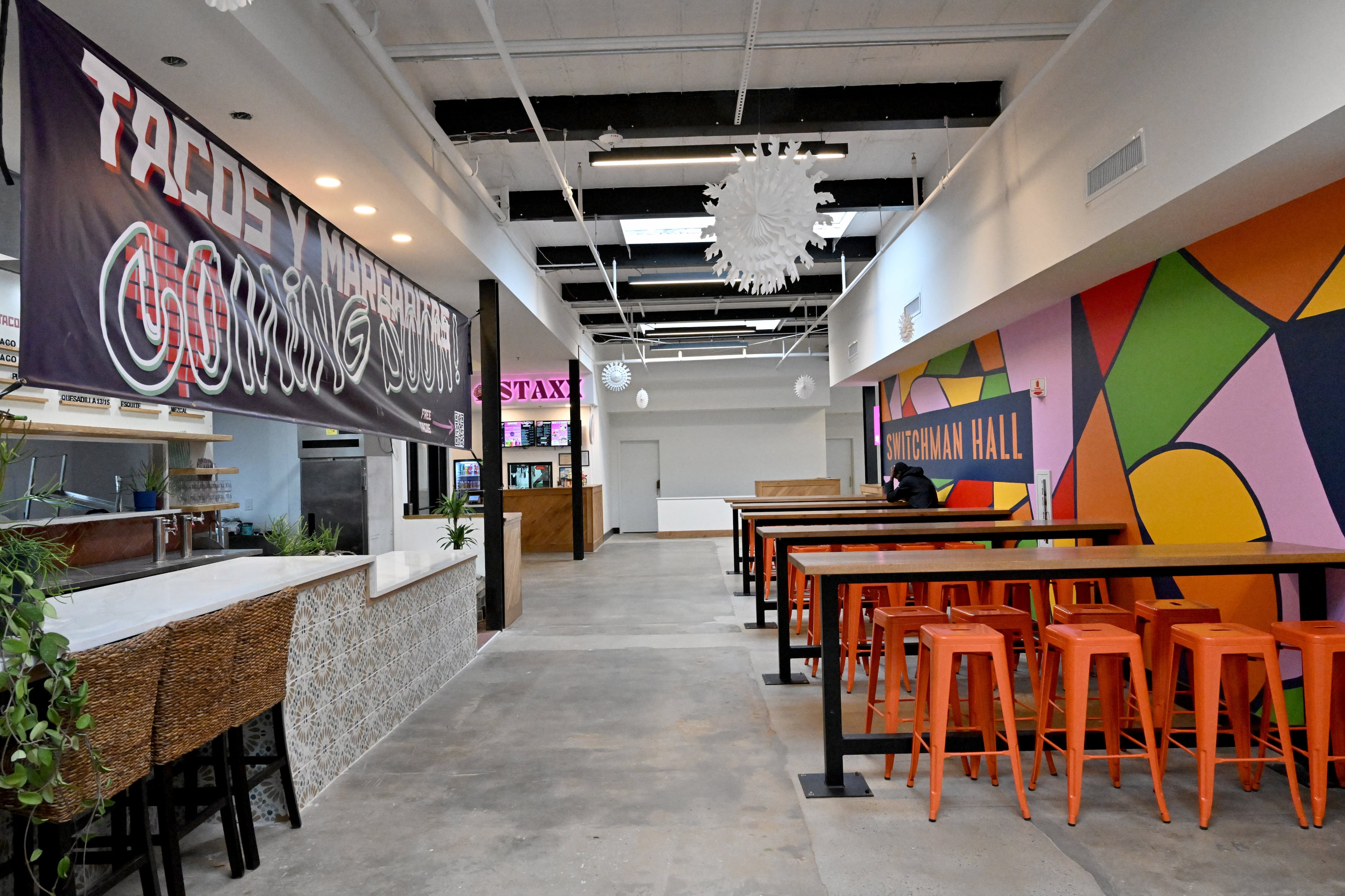 In this photo from February, Andy Bibliowicz's concept Te Quiero Tacos is on the left, but it will no longer open in the food hall. (Hyosub Shin/AJC)