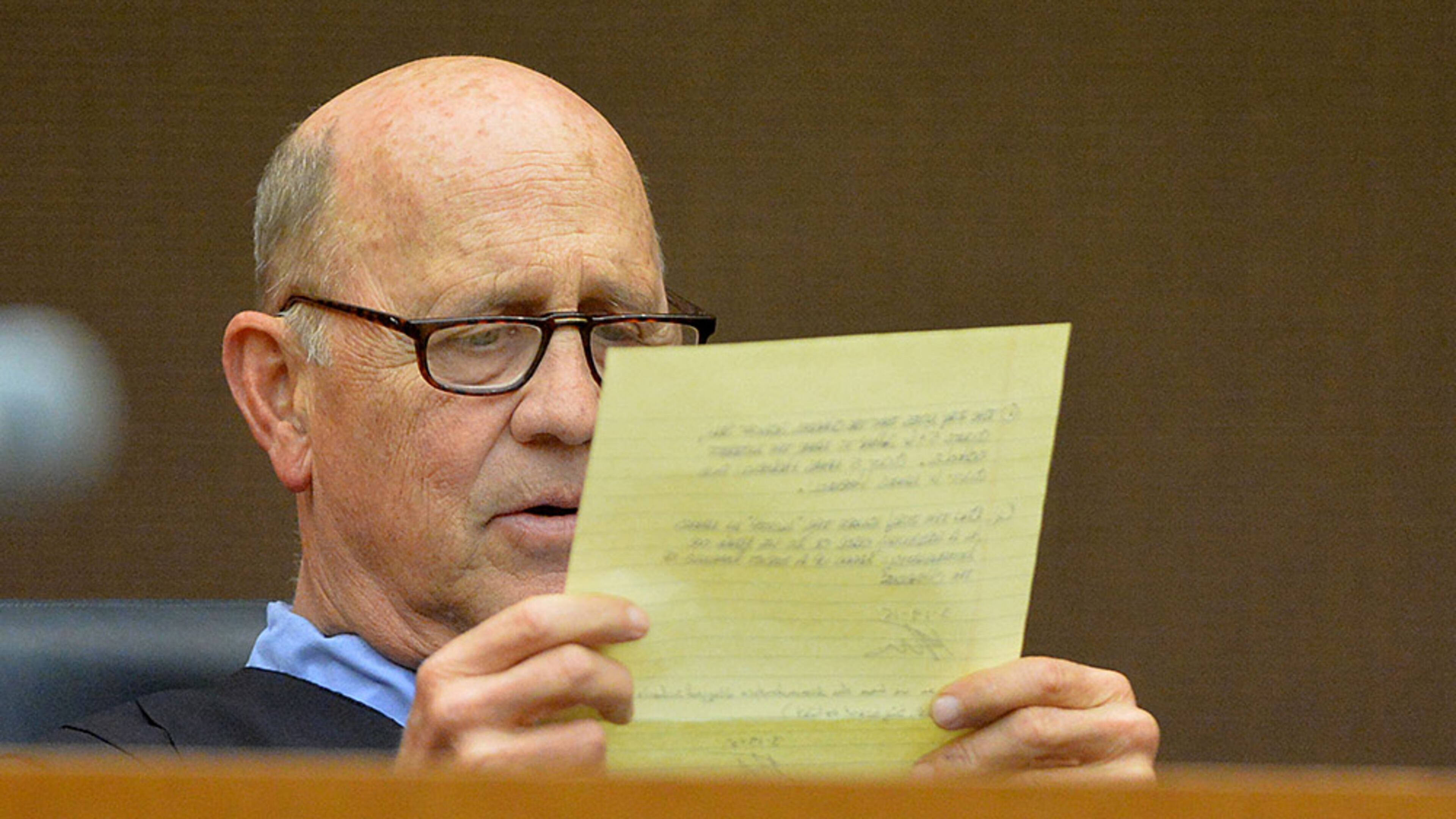 MARCH 19, 2015 ATLANTA Fulton County Superior Court Judge Jerry Baxter responds a question from the jury about the indictment against former APS SRT Director Sharon Davis Williams during their deliberations in the Atlanta Public Schools test-cheating trial in Fulton County Superior Court, Thursday, March 19, 2015. Jurors started deliberations at 10:50 a.m. Thursday. The jurors must sort through roughly five months' worth of evidence against a dozen defendants accused of engaging in a racketeering conspiracy to inflate scores on standardized tests. The trial began in August with a jury-selection process that lasted six weeks, then opening arguments and testimony began in late September. (Atlanta Journal-Constitution, Kent D. Johnson, Pool)