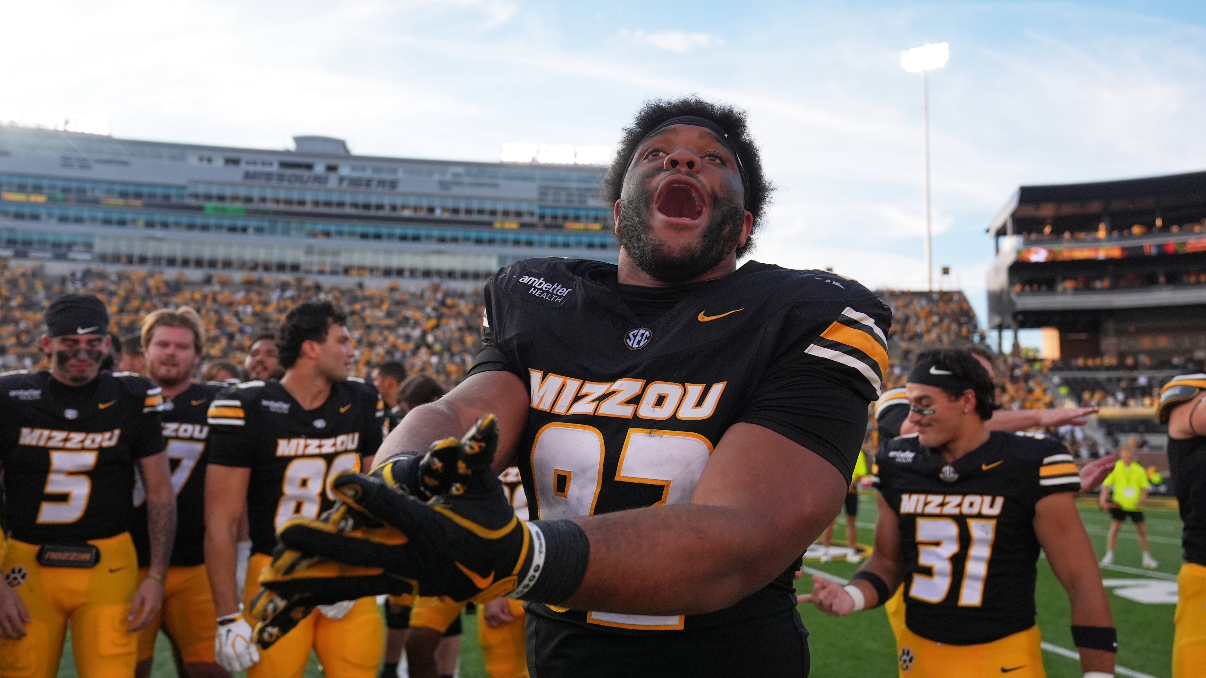 Missouri defensive tackle Jason Dowell celebrates a victory over Florida with his teammates following an NCAA college football game Saturday, Oct. 3, 2026, in Columbia, Mo. (AP Photo/Jeff Roberson)