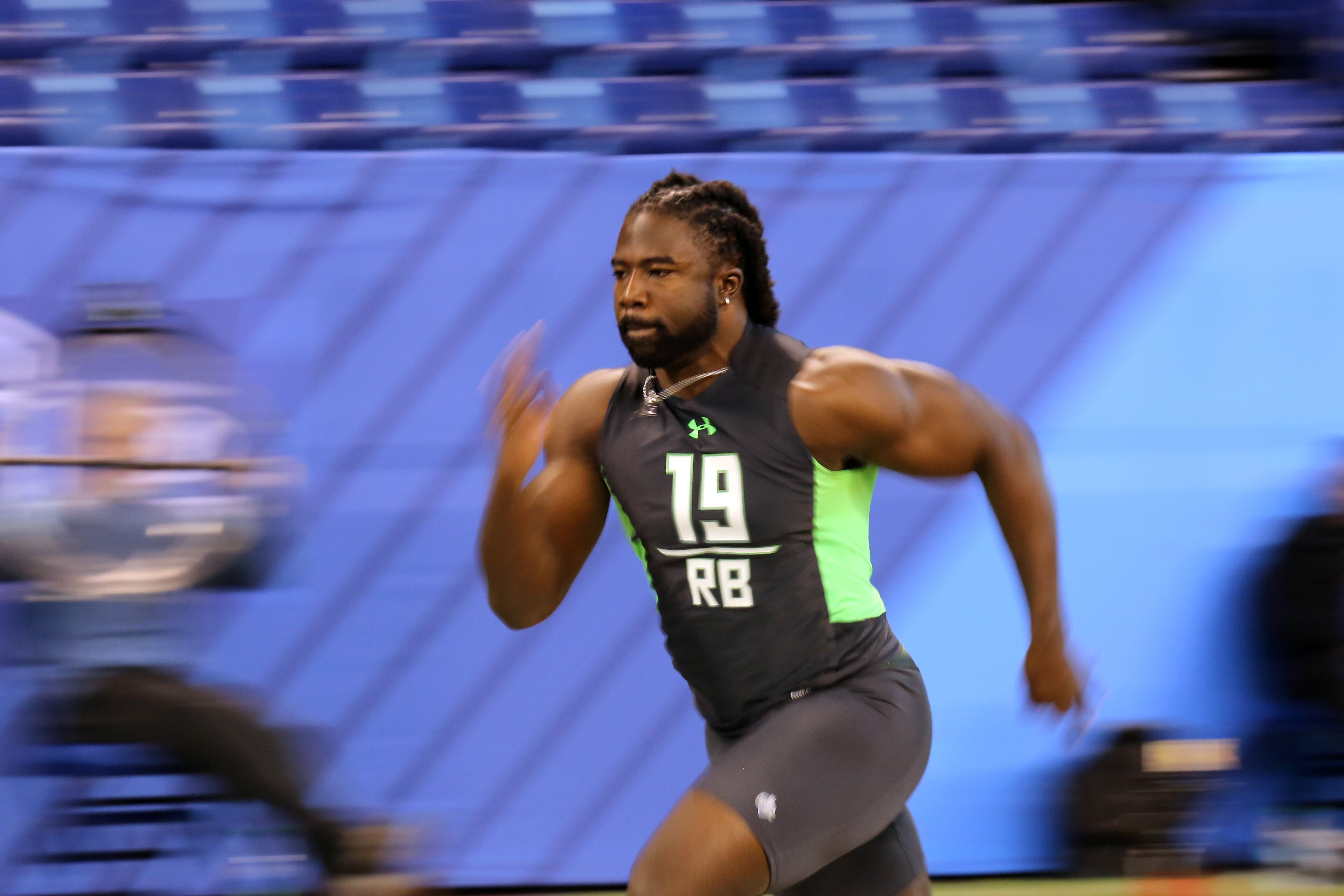 Georgia running back Keith Marshall during the 40 yard dash at the NFL football scouting combine Friday, Feb. 26, 2016, in Indianapolis. (AP Photo/Gregory Payan)