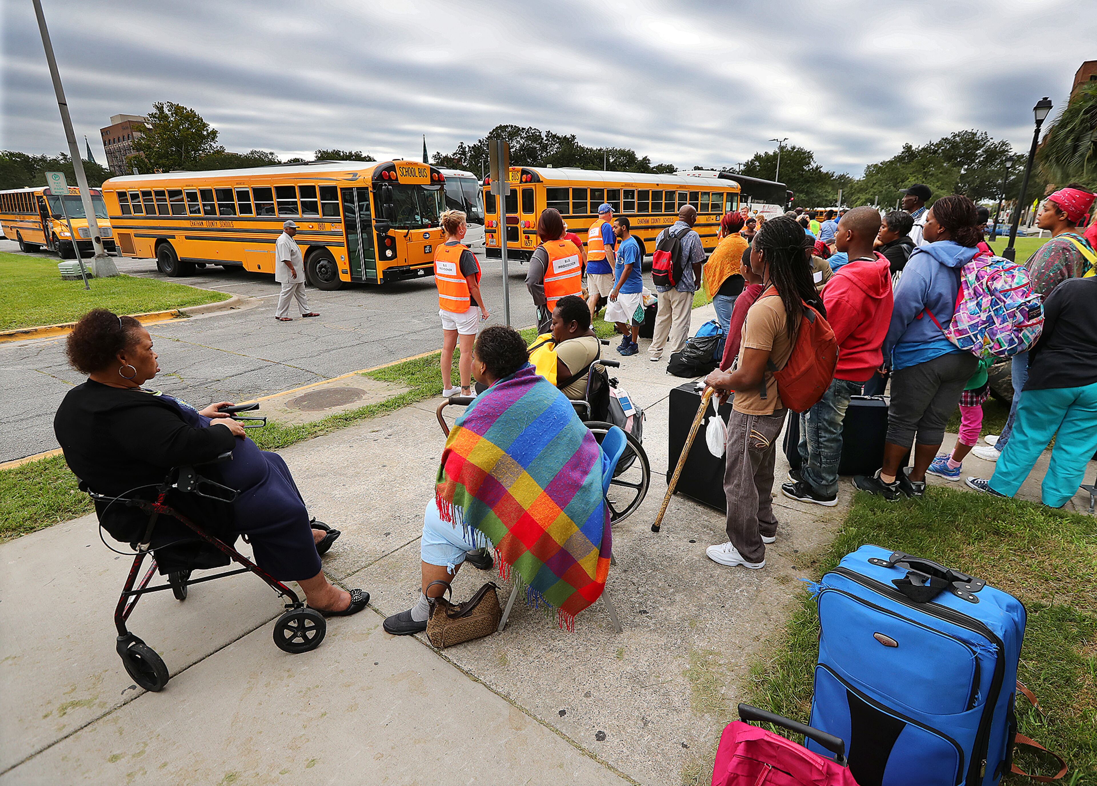 September 9, 2017 Savannah: Hundreds of local residents being evacuated from the city at the Savannah Civic Center wait to board buses during a mandatory evacuation for Hurricane Irma on Saturday, September 9, 2017, in Savannah. Officials are expecting 1,500 to 3,000 without transportation to leave by buses that are being provided. Curtis Compton/ccompton@ajc.com