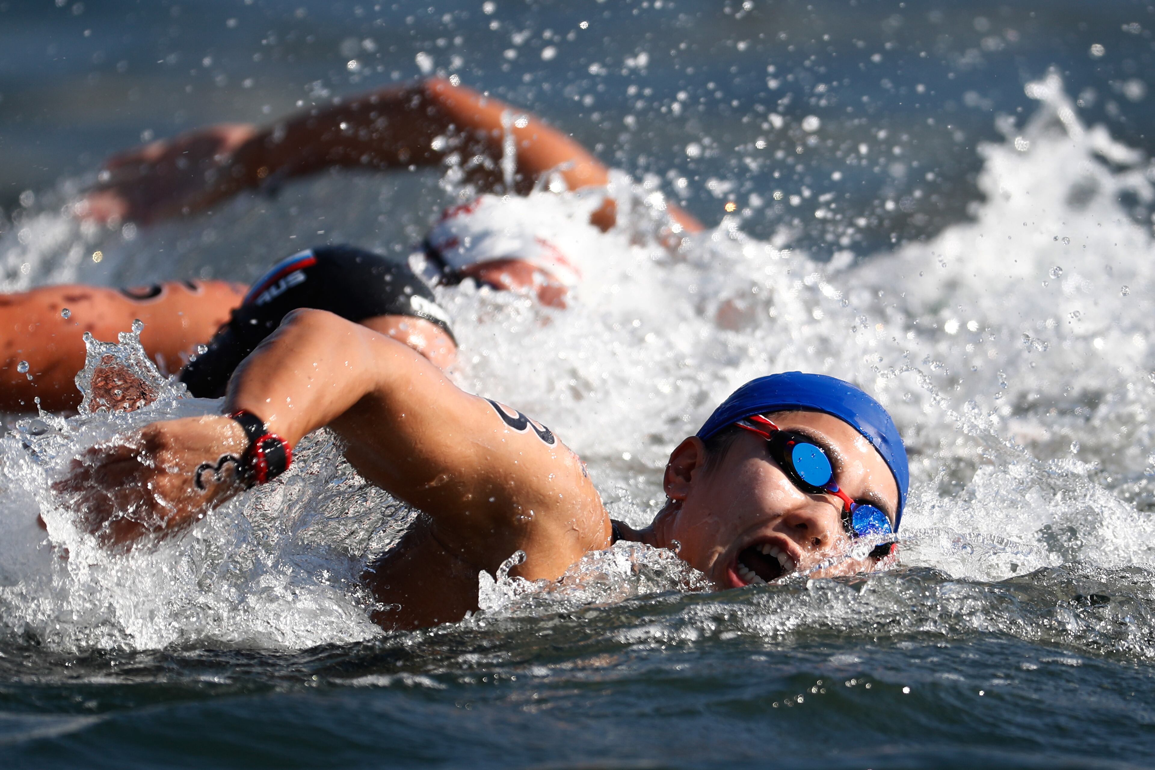 Yumi Kida of Japan competes in the Women's 10km Marathon Swimming on day 10 of the Rio 2016 Olympic Games at Fort Copacabana on August 15, 2016 in Rio de Janeiro, Brazil. (Photo by Clive Rose/Getty Images)