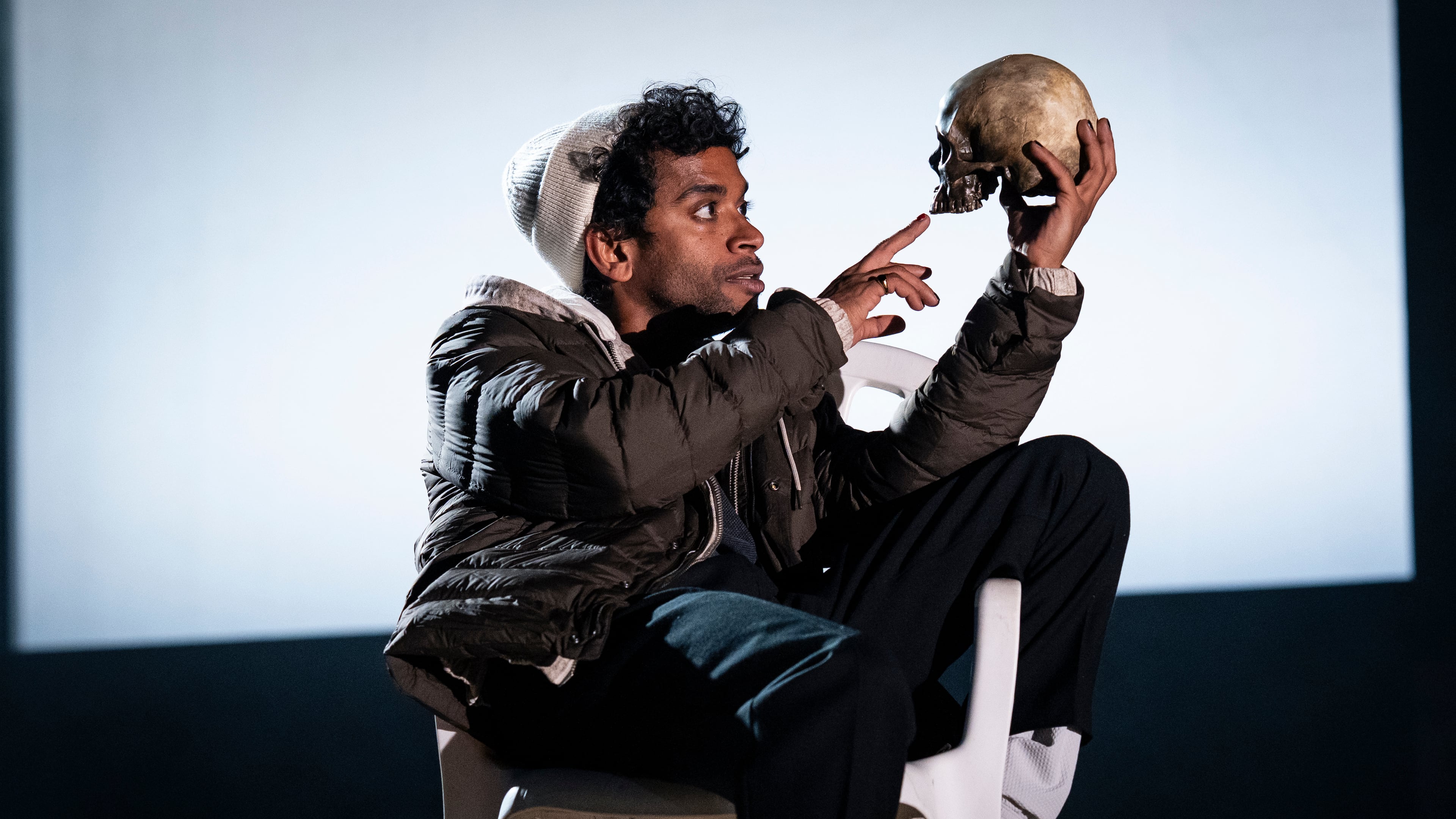 This image released by Polk & Co. shows Hiran Abeysekera in the role of Hamlet at the National Theatre in London on Sept. 25, 2025. (Sam Taylor/Polk & Co. via AP)