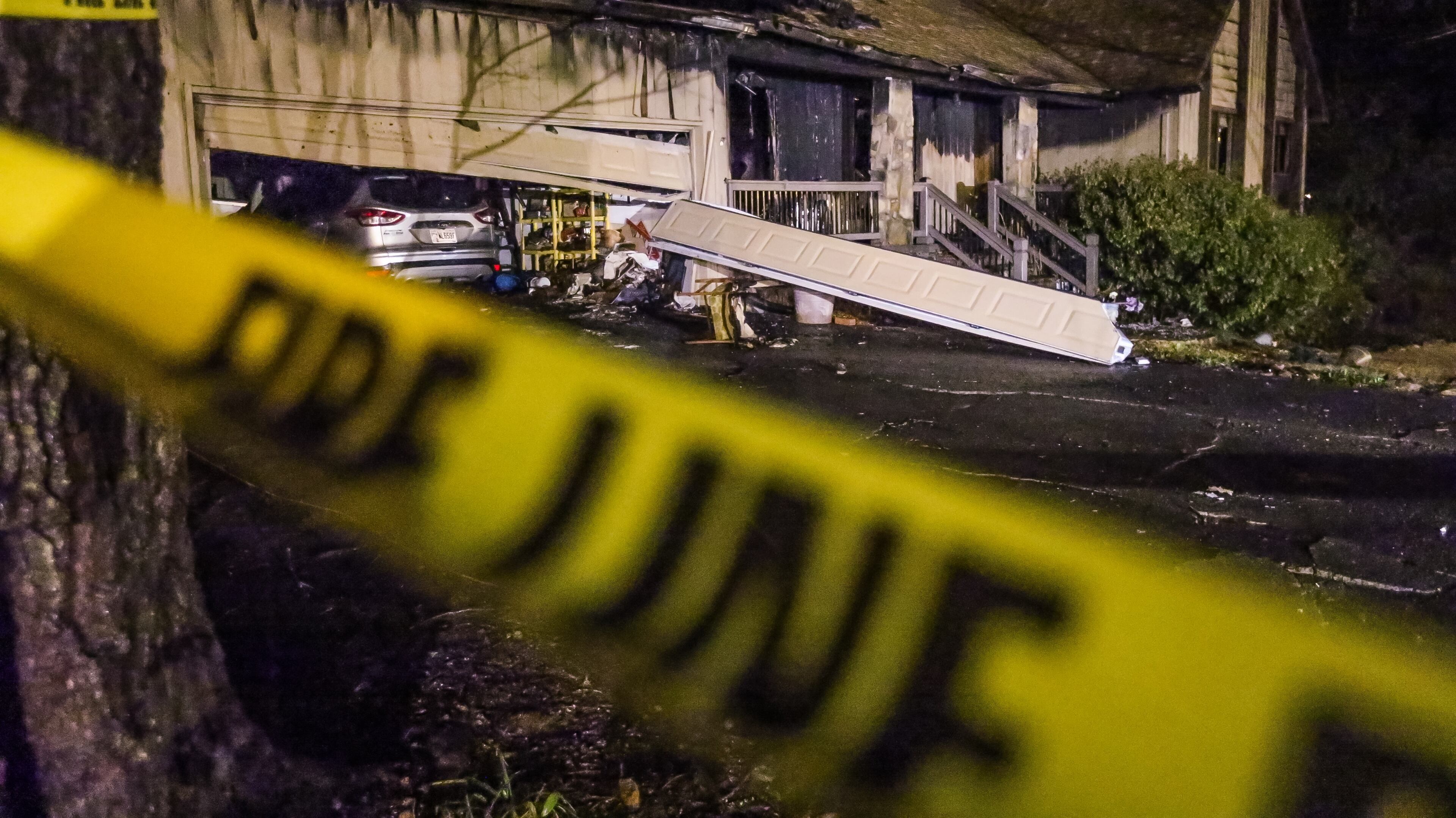 A man was critically injured in a fire that ripped through a Stone Mountain home Tues., Feb. 23, 2016. JOHN SPINK / JSPINK@AJC.COM