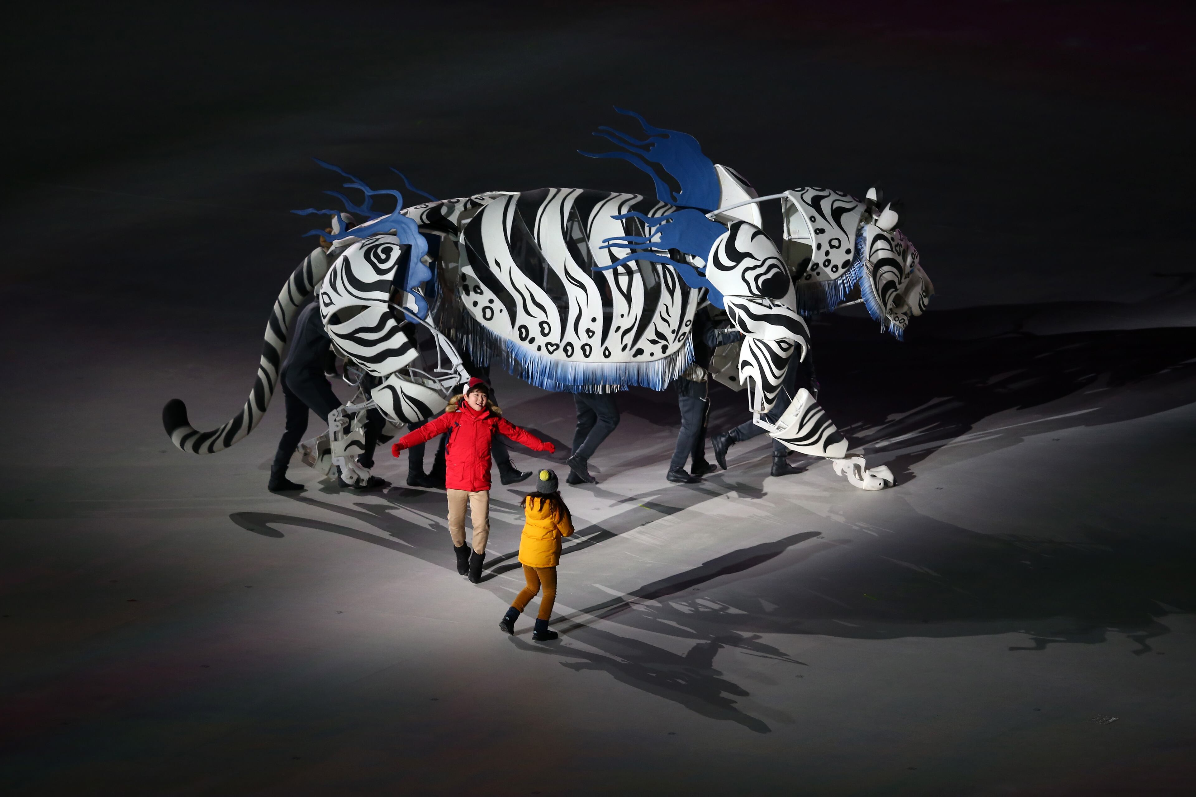 PYEONGCHANG-GUN, SOUTH KOREA - FEBRUARY 09: Actors portraying a white tiger are seen during the "Land of Peace" segment of the Opening Ceremony of the PyeongChang 2018 Winter Olympic Games at PyeongChang Olympic Stadium on February 9, 2018 in Pyeongchang-gun, South Korea. (Photo by Dan Istitene/Getty Images)