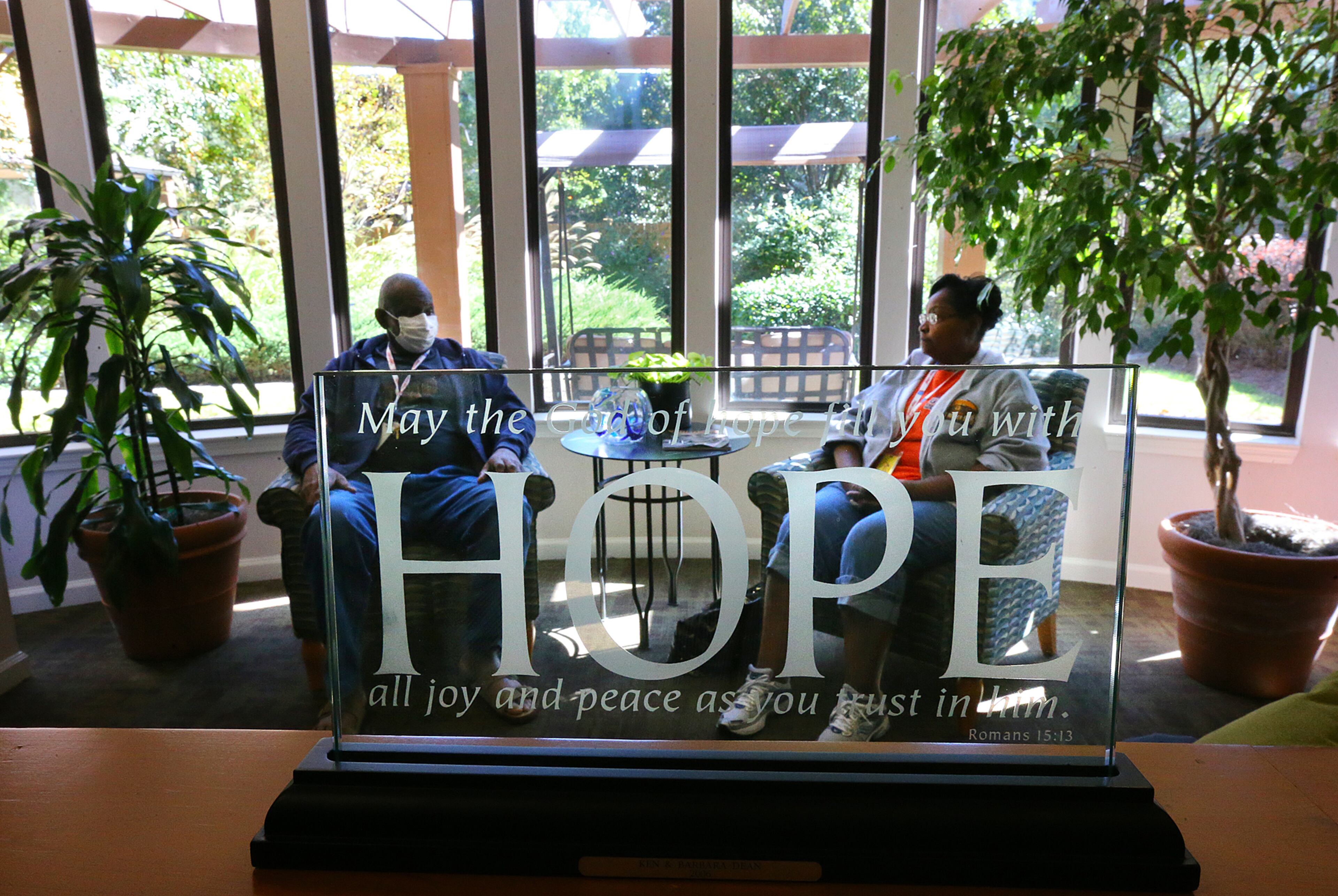 100514 DECATUR: Walter Green, 64, and his wife Earlene, 63, Fairfield, AL, relax in the lobby of the Atlanta Hope Lodge where they are staying after his bone marrow transplant on Sunday, Oct. 5, 2014, in Decatur. The American Cancer Society's Hope Lodge provides free lodging to patients going through cancer treatment. CURTIS COMPTON / CCOMPTON@AJC.COM