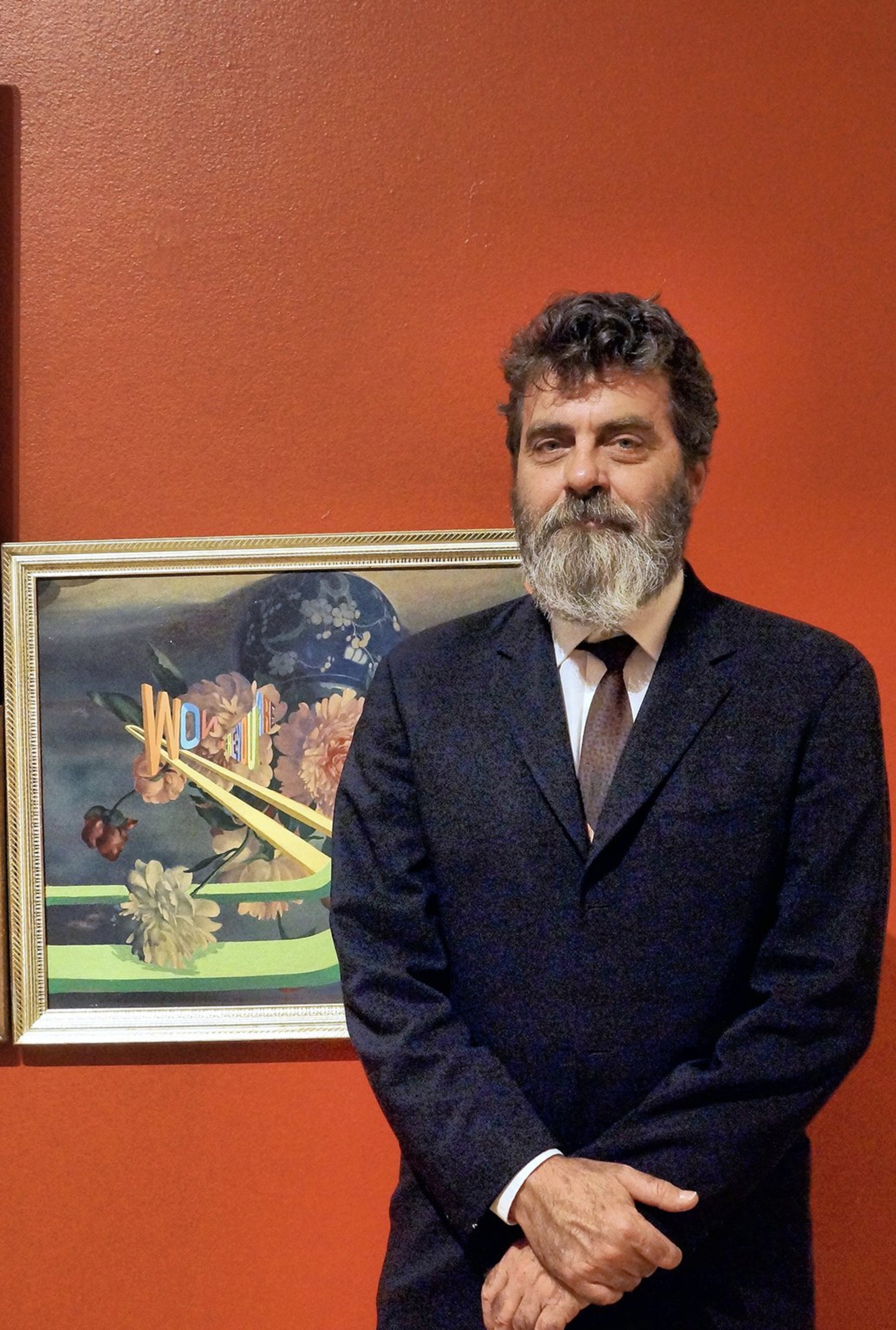 Artist Wayne White in front of one of his paintings at the Hunter Museum of American Art in Chattanooga. PHOTO CREDIT MARK A HERNDON