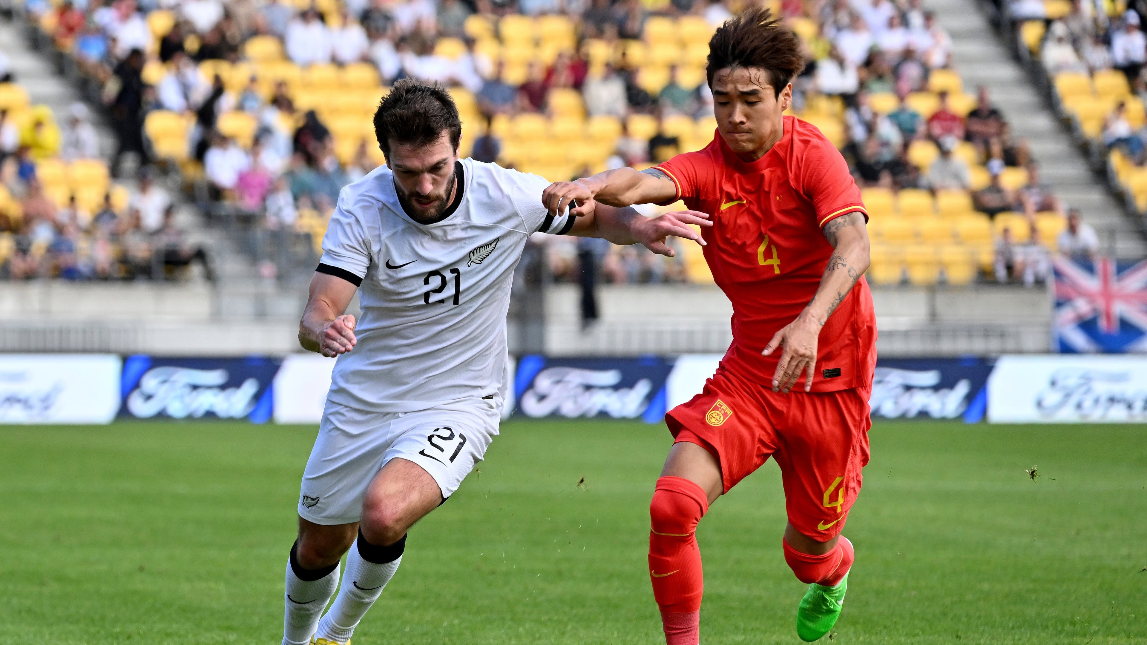 FILE - Tim Payne, left, of the All Whites and Shihao Wei of China compete for the ball during the international soccer friendly between New Zealand and China in Wellington, New Zealand, Sunday, March 26, 2023. (Masanori Udagawa/Photosport via AP,File)