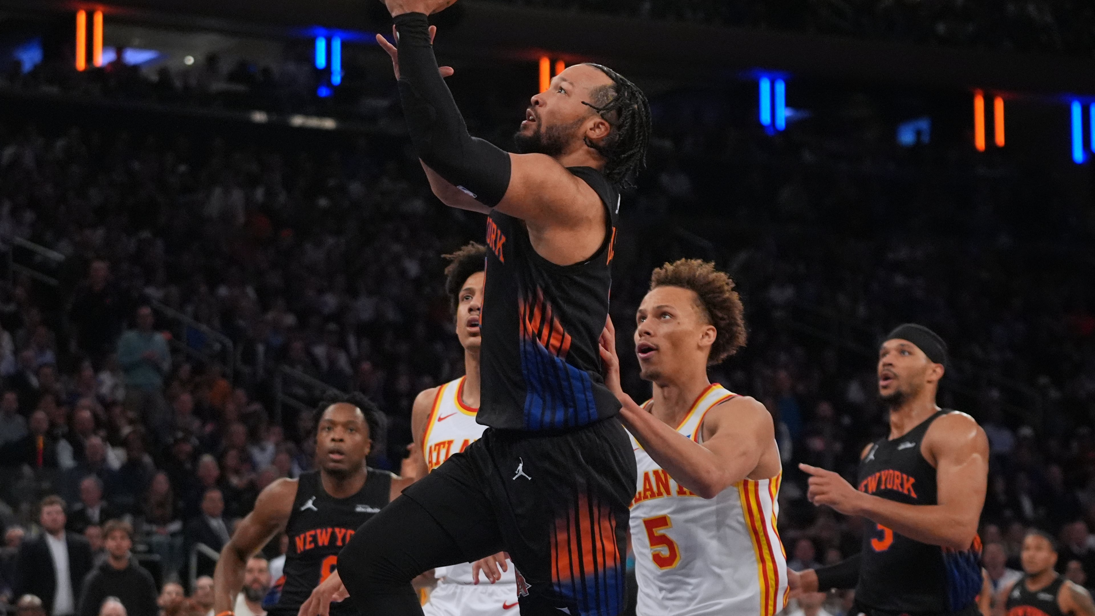 New York Knicks' Jalen Brunson drives past Atlanta Hawks' Dyson Daniels (5) during the first half in Game 5 of a first-round NBA playoffs basketball series, Tuesday, April 28, 2026, in New York. (AP Photo/Frank Franklin II)