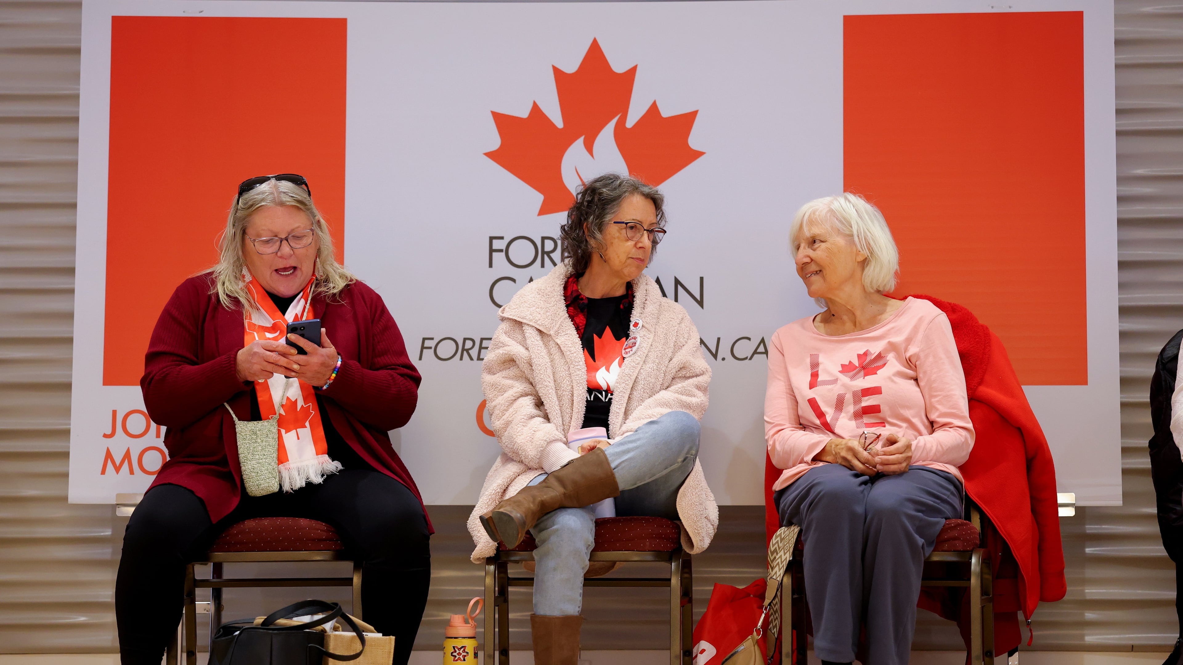 Supporters wait for results at the pro-Canada watch party in Edmonton, Alberta Monday, Oct. 19, 2026. (James Maclennan/The Canadian Press via AP)