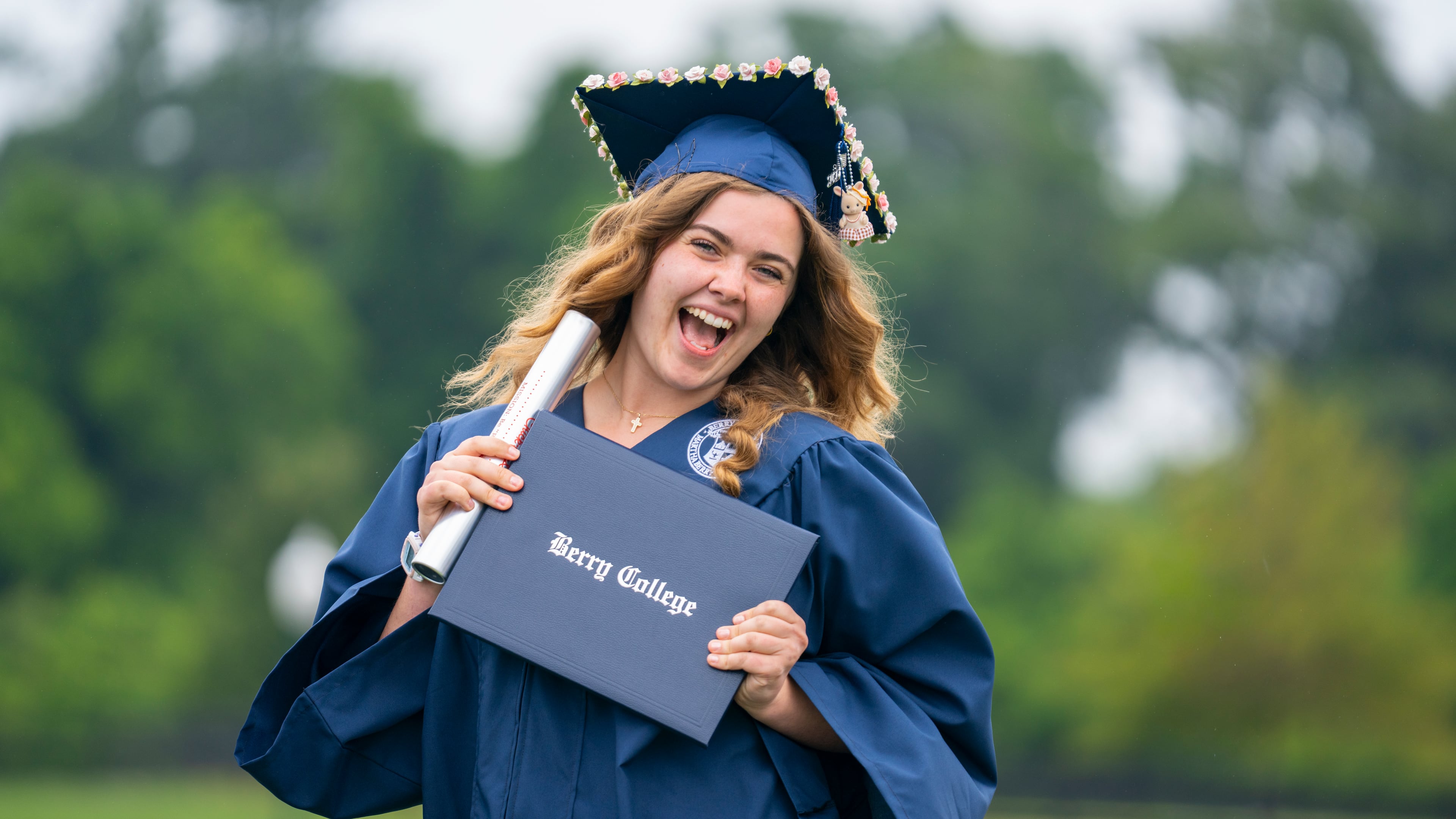 Amelia Ousley celebrates offstage after receiving her diploma during Berry College's commencement ceremony on Saturday, May 9, 2026. (Daniel Whiting/Berry College)
